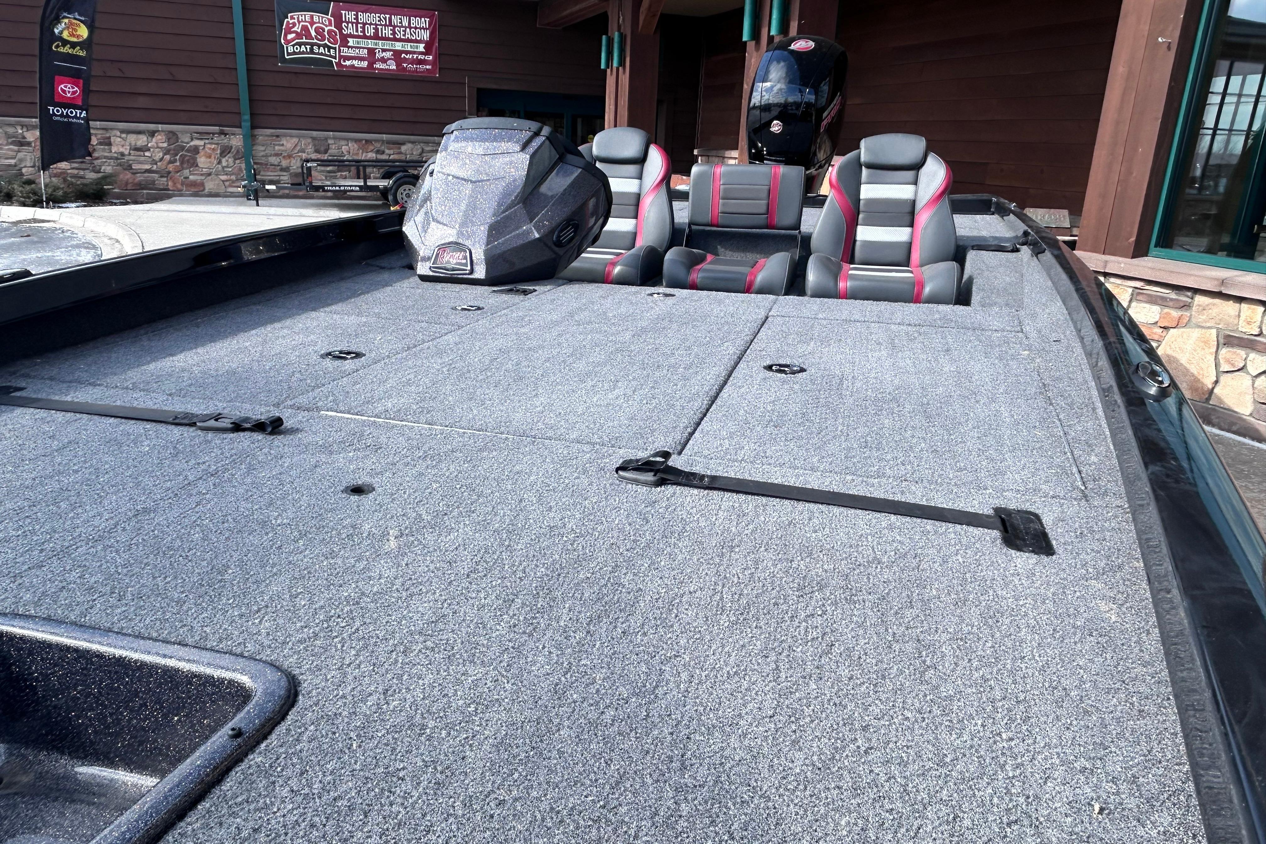 2025 Ranger RT198P boat interior with gray carpet and dual seats.