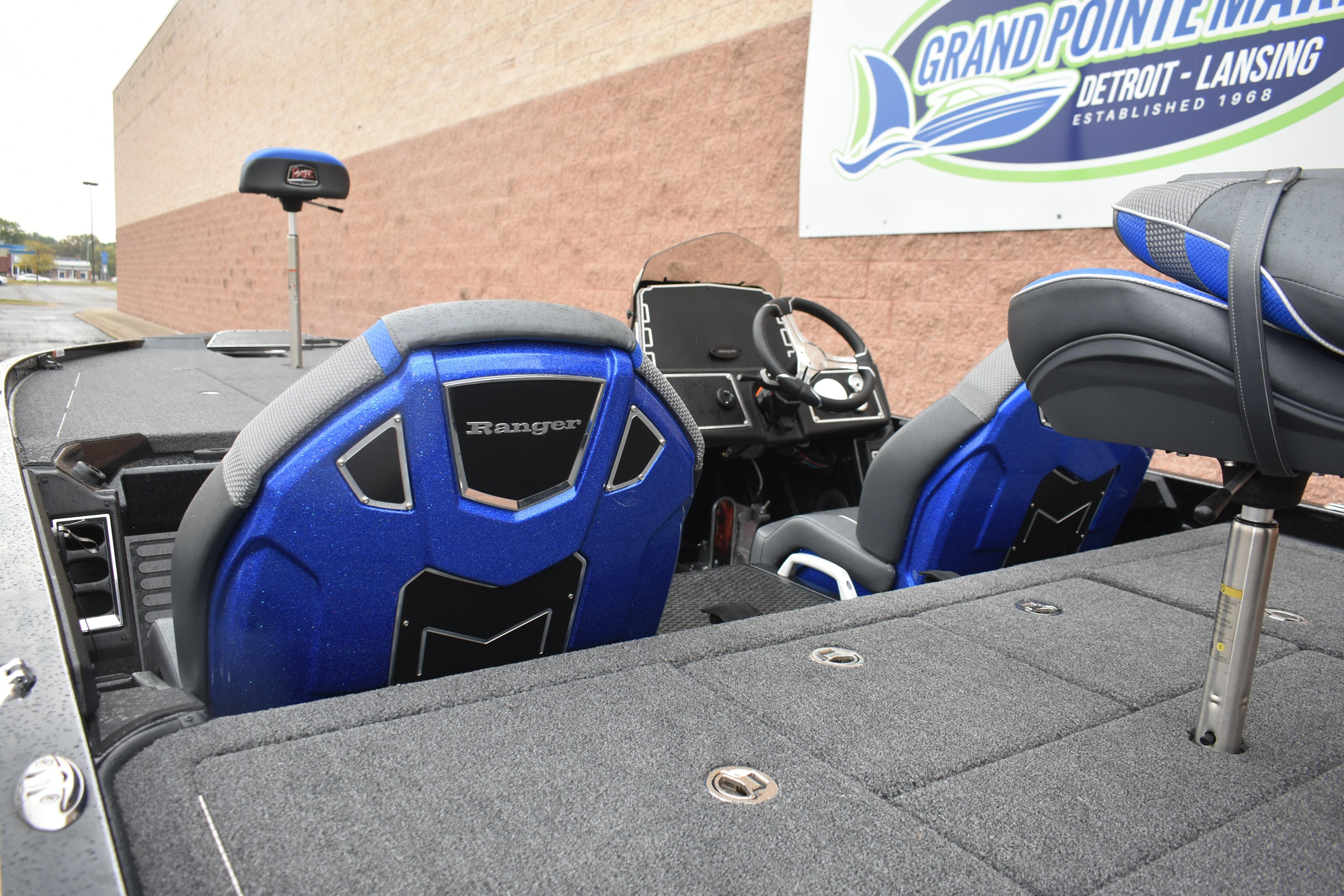 2025 Ranger Z521 boat interior with blue seats at Grand Pointe Marina.