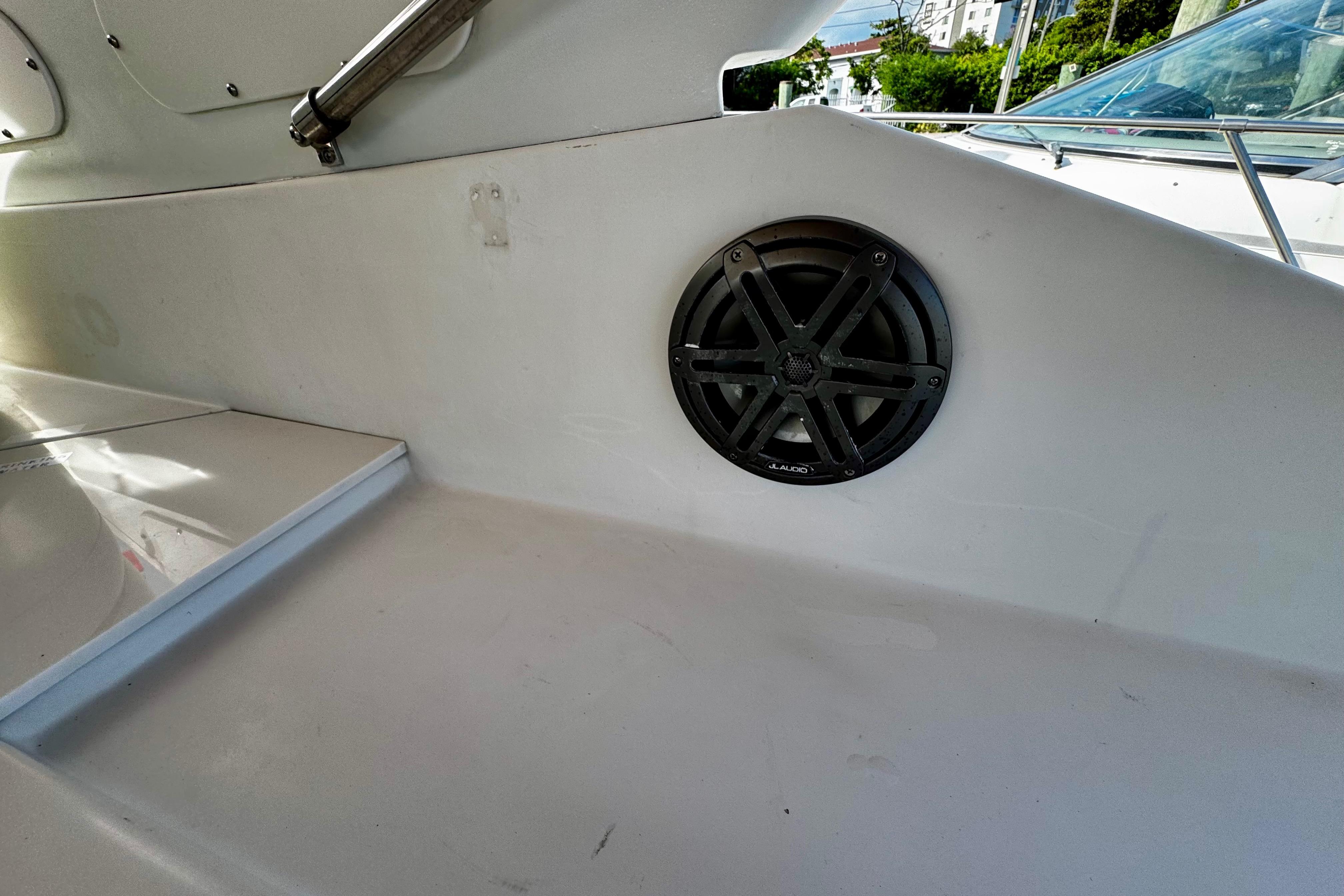 Speaker installed on a 2000 Trojan 440 Express boat interior.