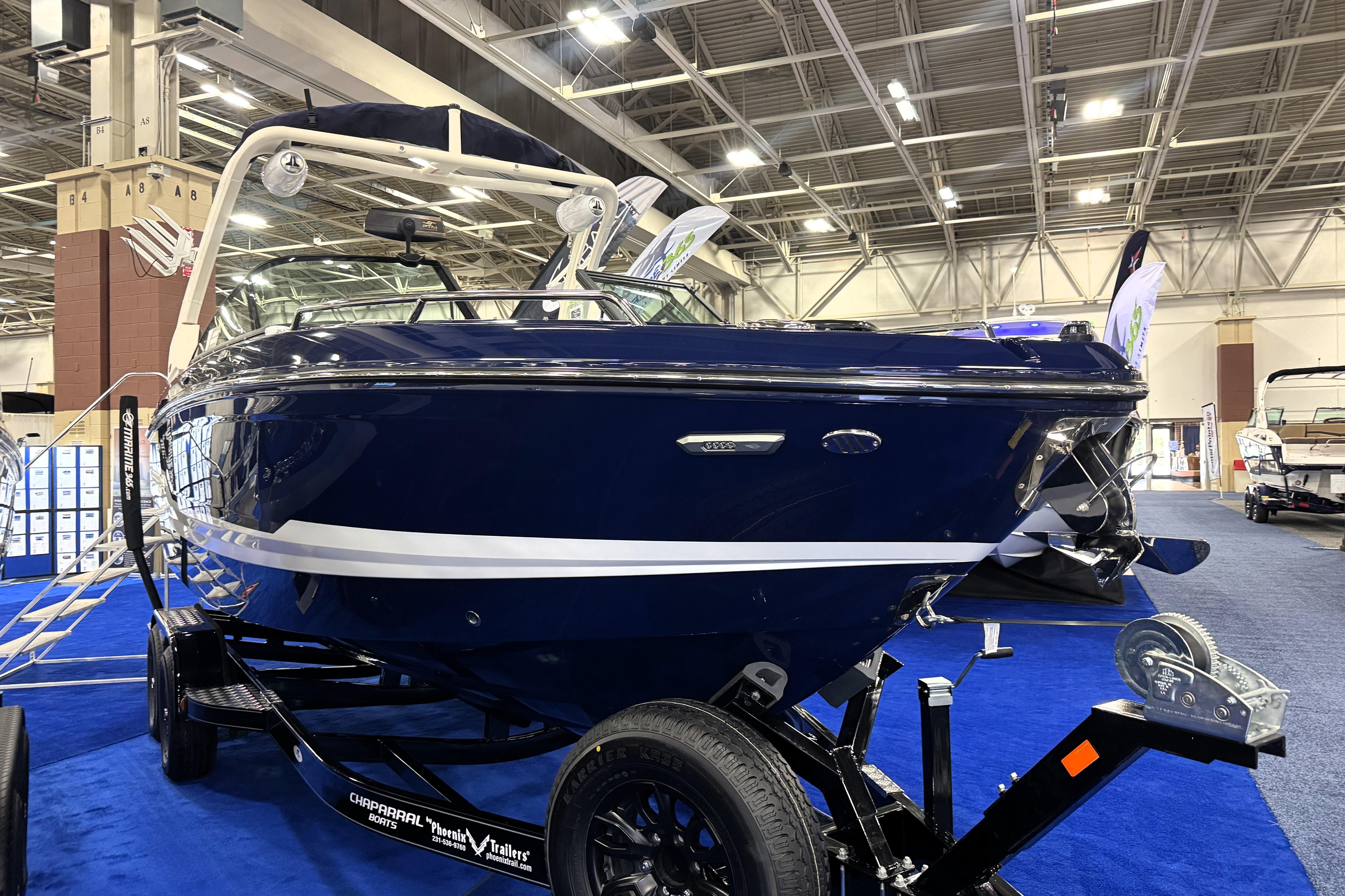 2026 Chaparral GTS 6 boat displayed indoors on a trailer, showcasing sleek design.