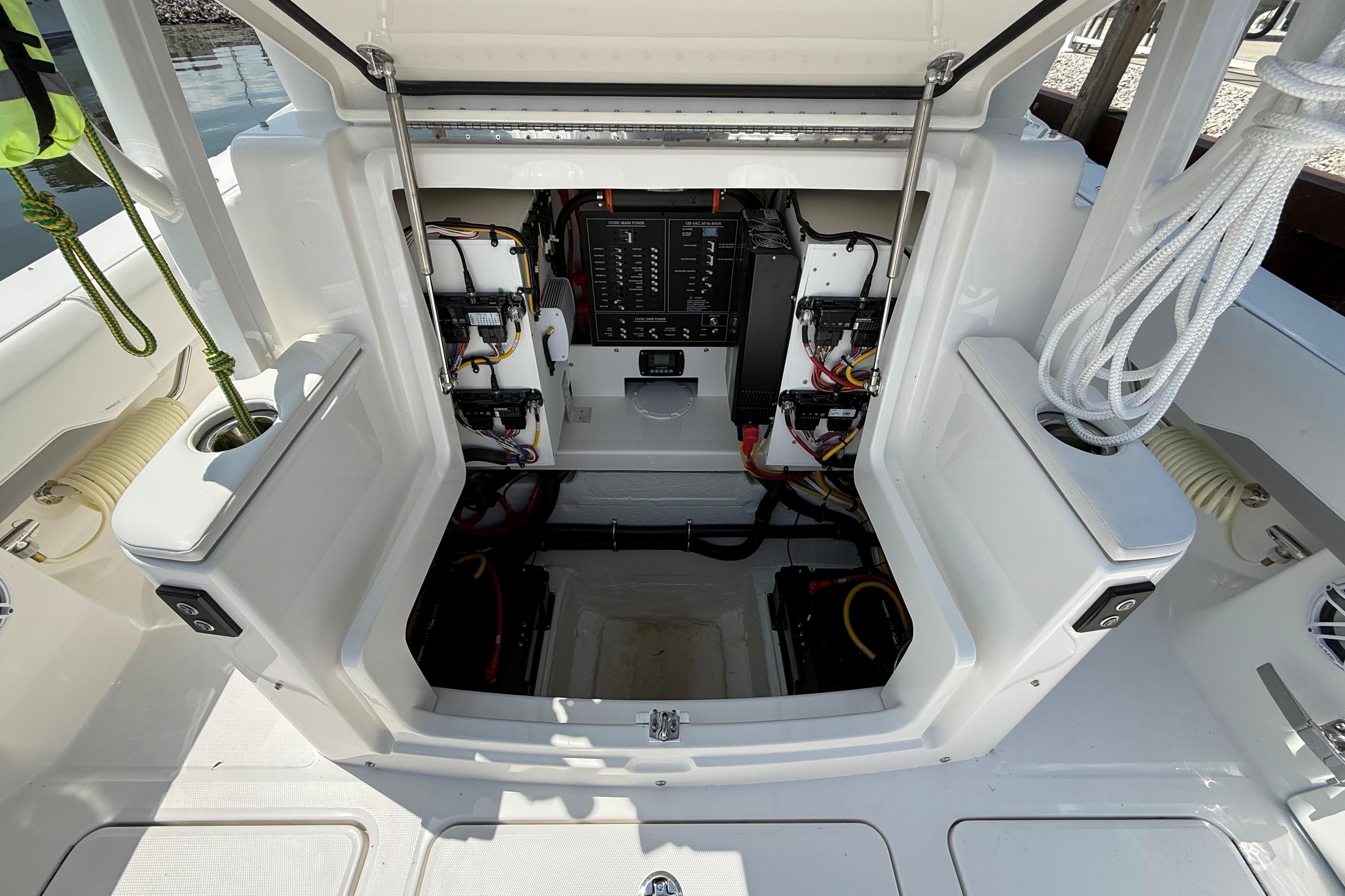 Open engine compartment of 2026 Regulator 35 boat, showcasing wiring and components.