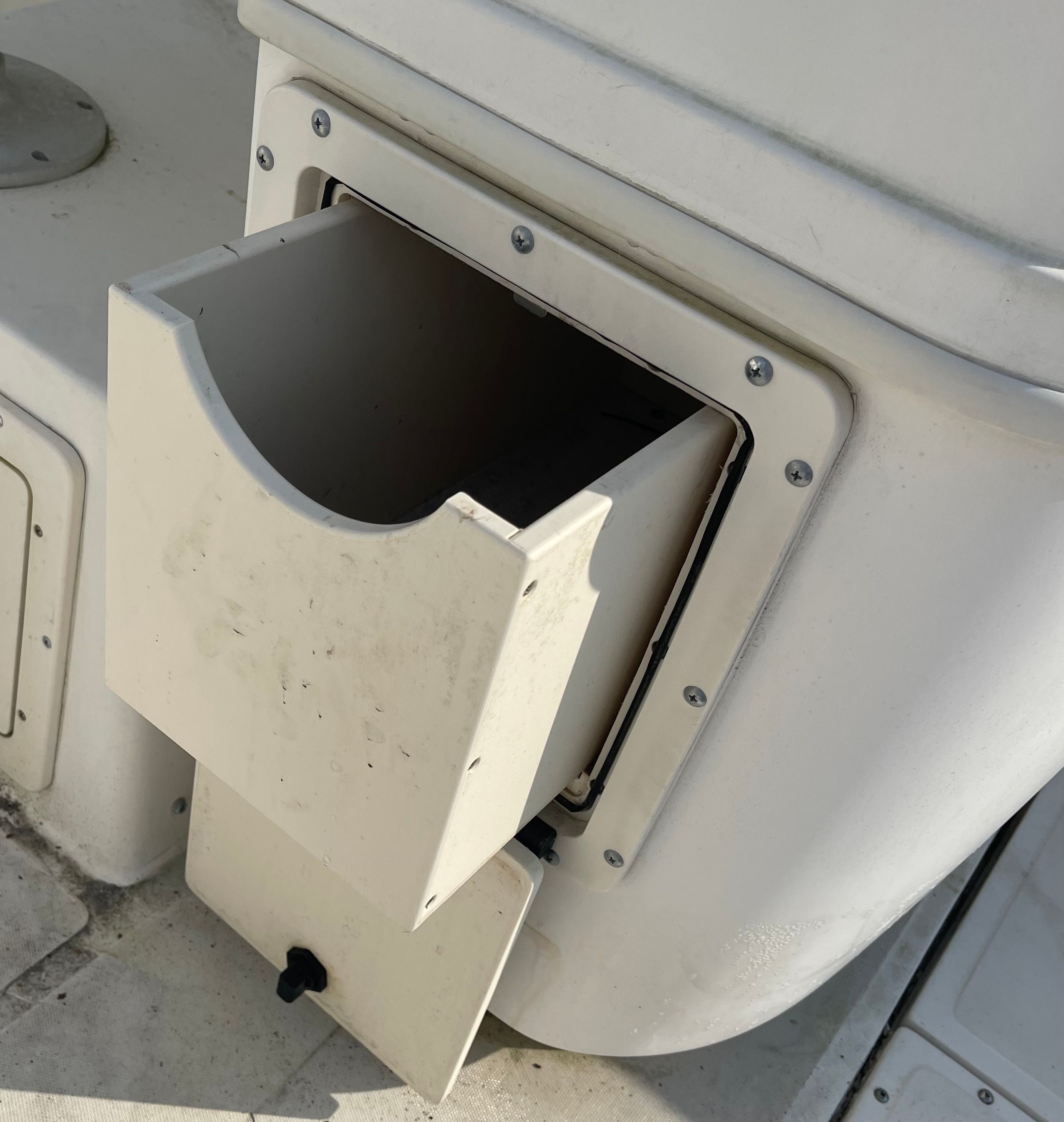Storage compartment on a 2001 Boston Whaler 26 Conquest boat.