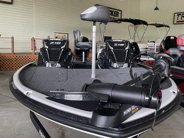 2025 Nitro Z18 boat with Minn Kota motor, displayed indoors.