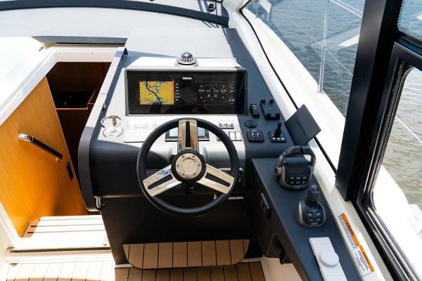 2022 Bavaria SR41 yacht helm with navigation system and controls.