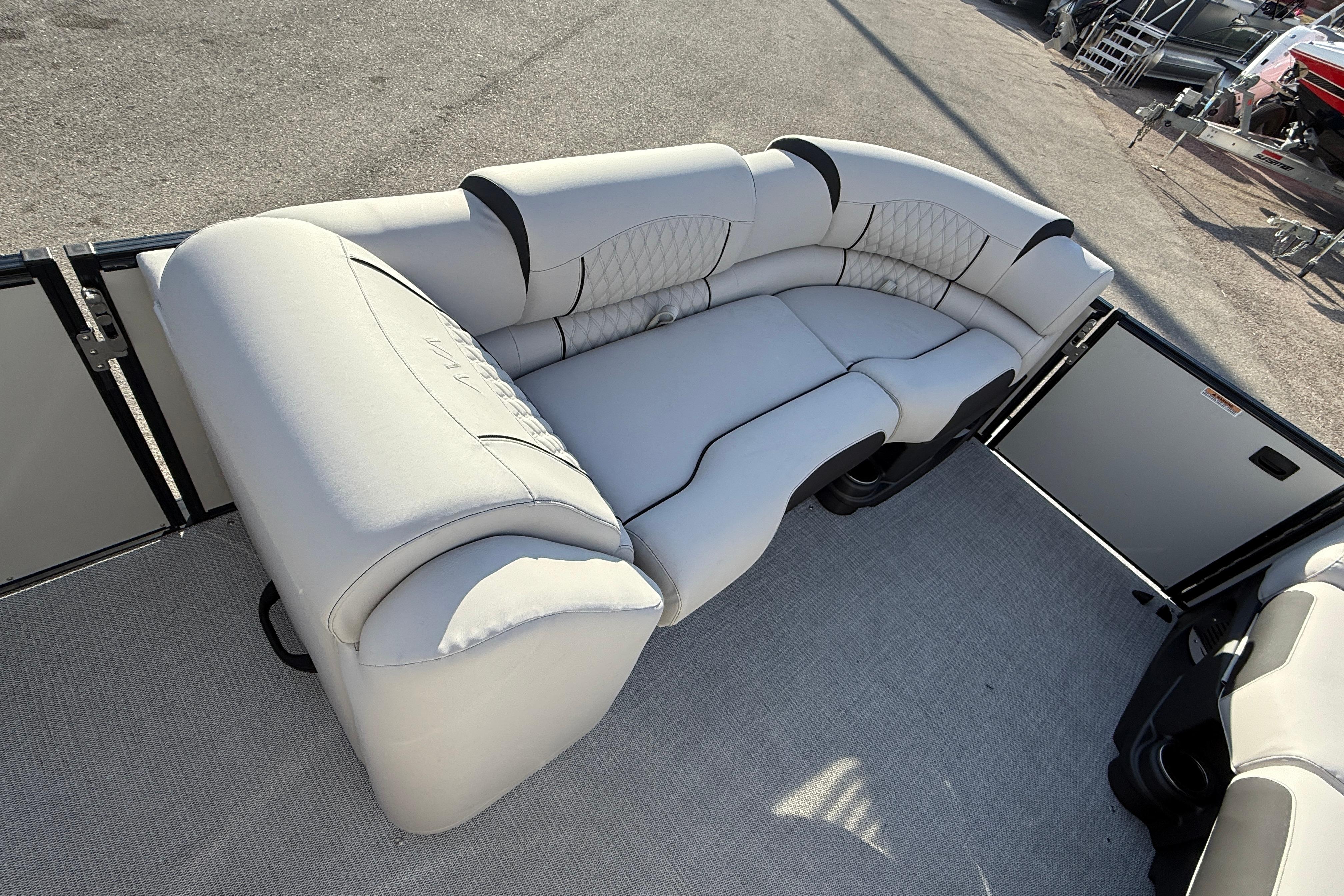 Luxurious seating on 2026 Avalon 2385 Catalina Quad Lounger, Tri Toon High Performance boat.