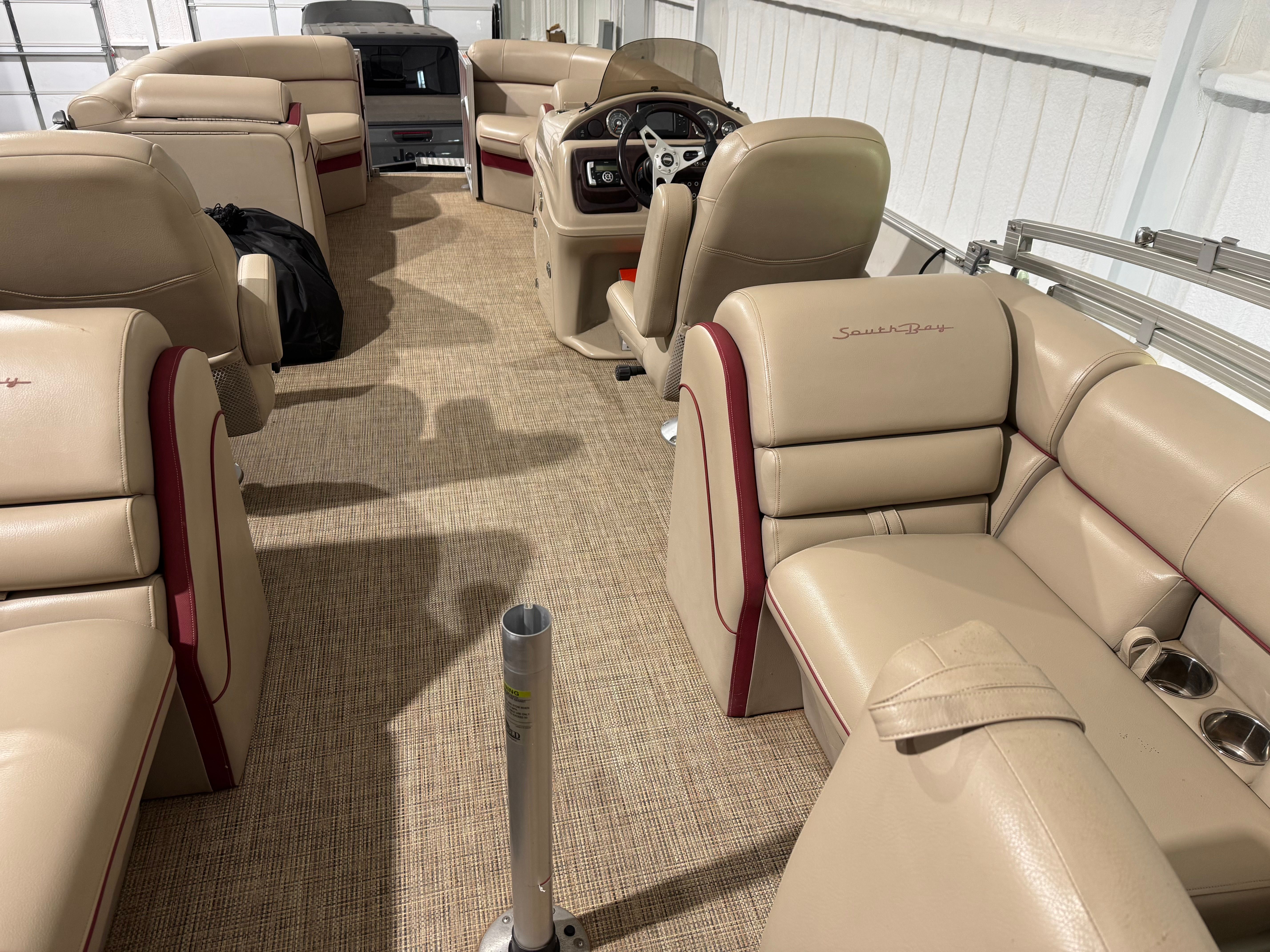 Interior of Custom 523 RS boat, beige leather seats, year 2016.