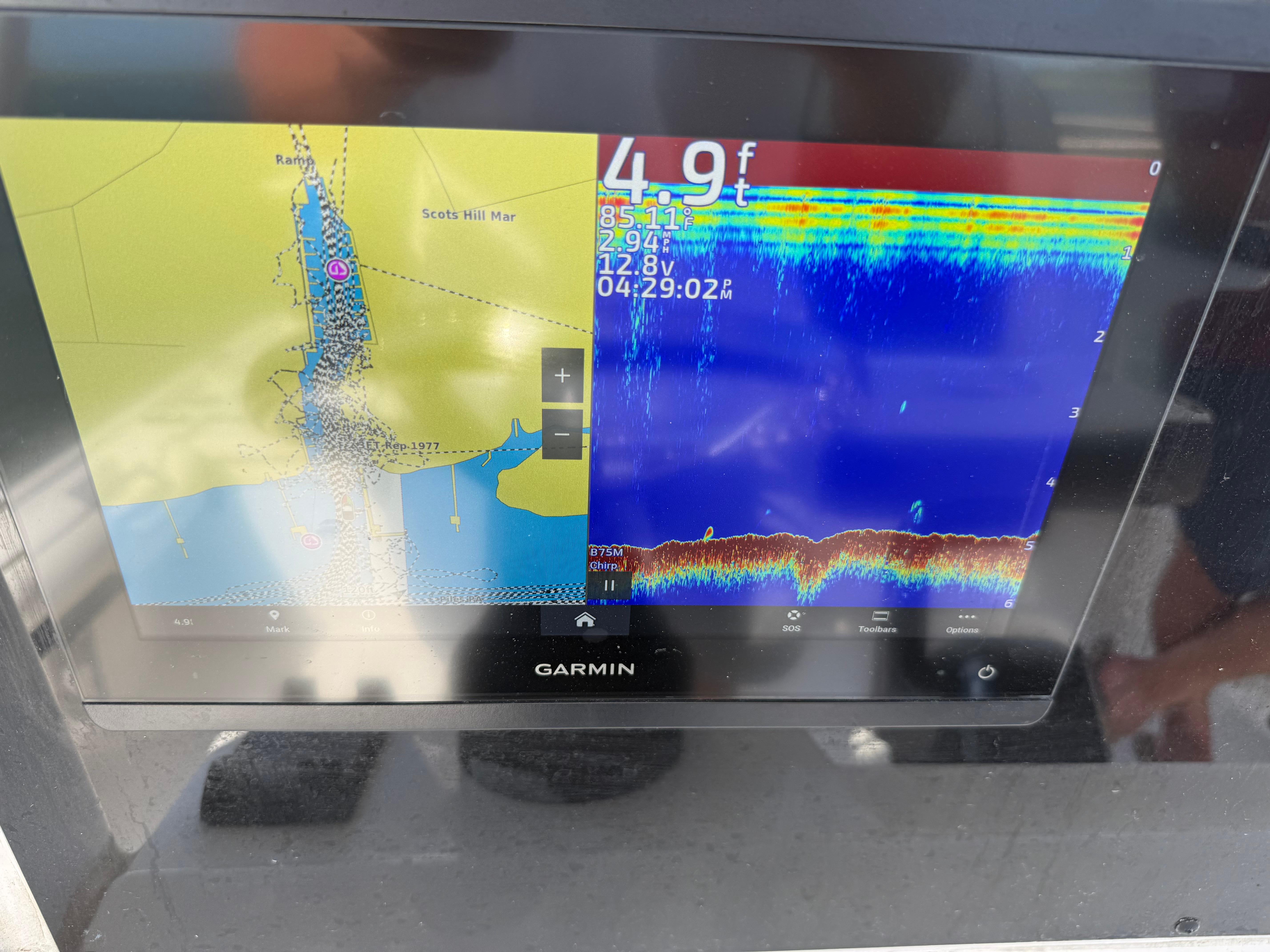Garmin marine display on 2023 Tidewater 2500CB showing navigation and sonar data.
