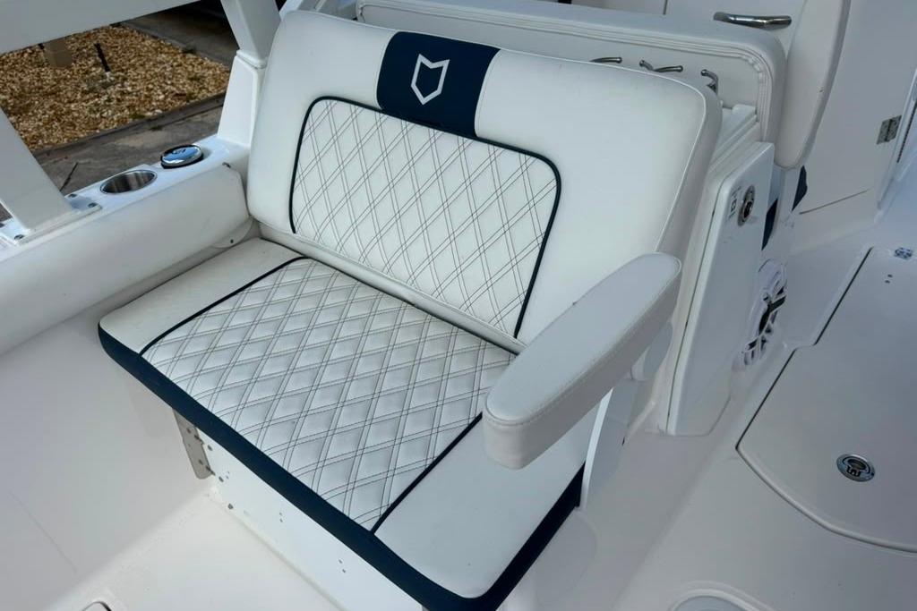 Luxurious seating on 2026 Sea Fox 288 Traveler boat with diamond-pattern upholstery.