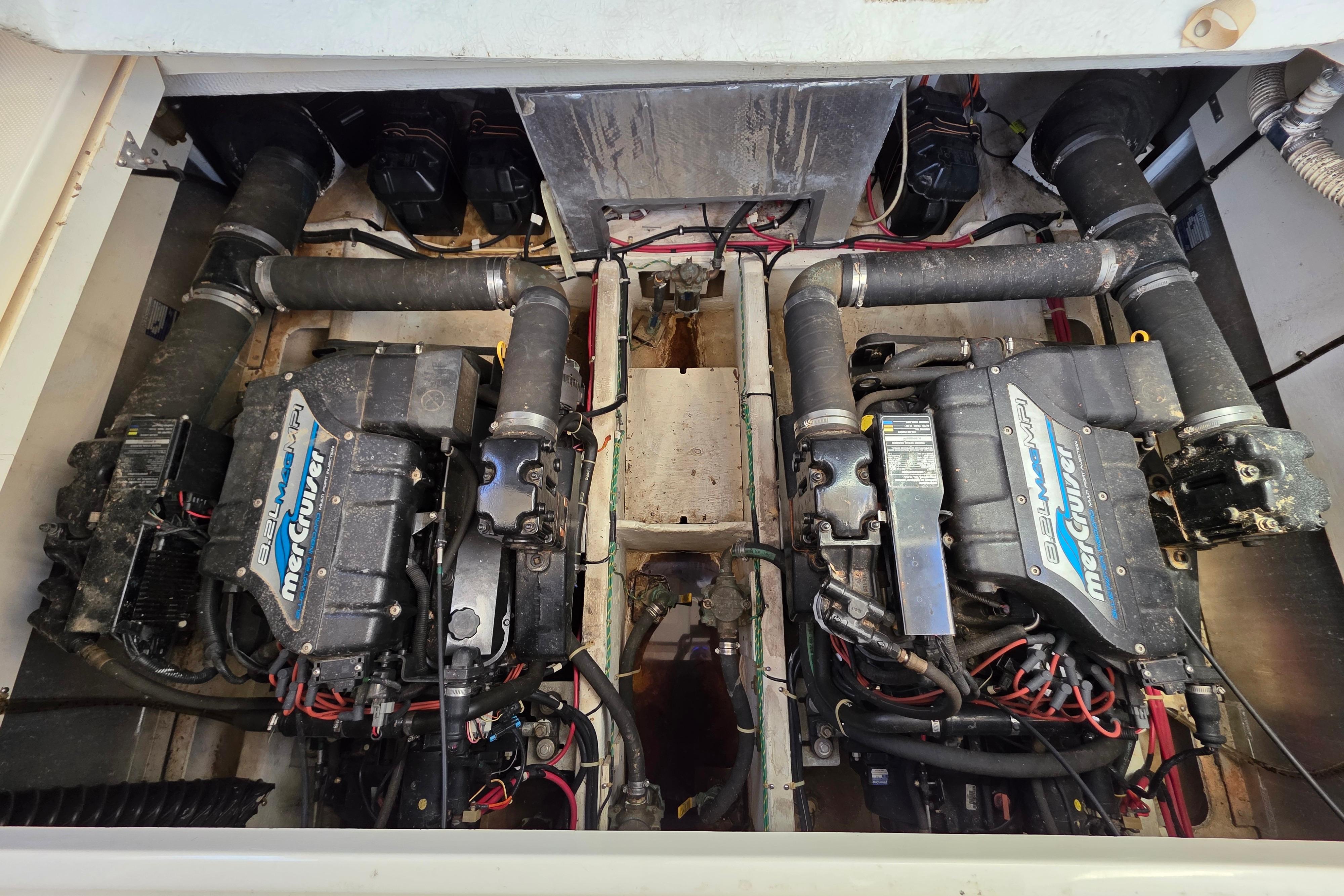 Engine compartment of a 1998 Maxum 3700 SCR with twin MerCruiser engines.