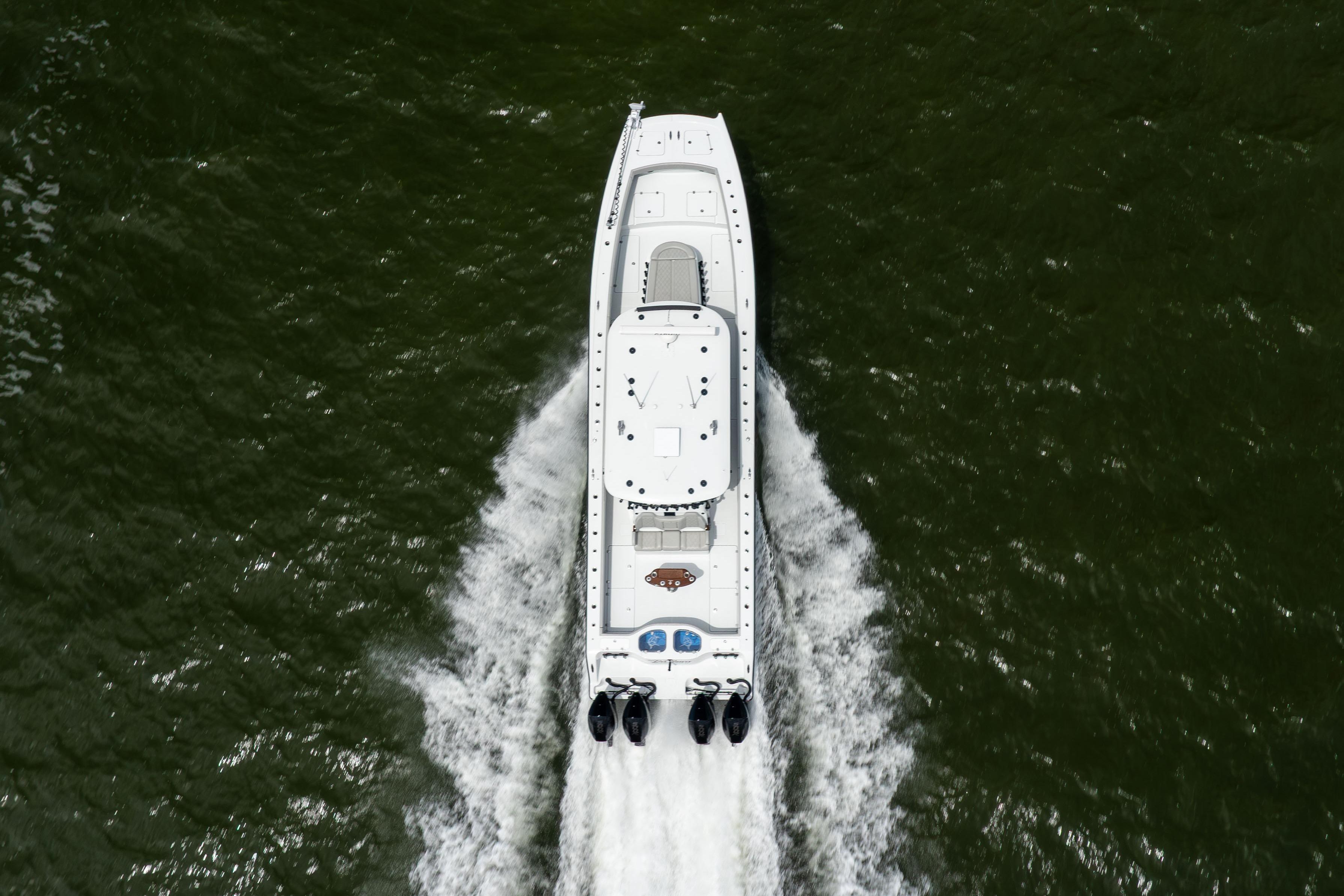Aerial view of 2025 Freeman 42 LR boat cruising on water.