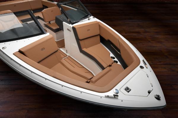 2025 Cobalt CS23 boat with luxurious tan seating and sleek design.