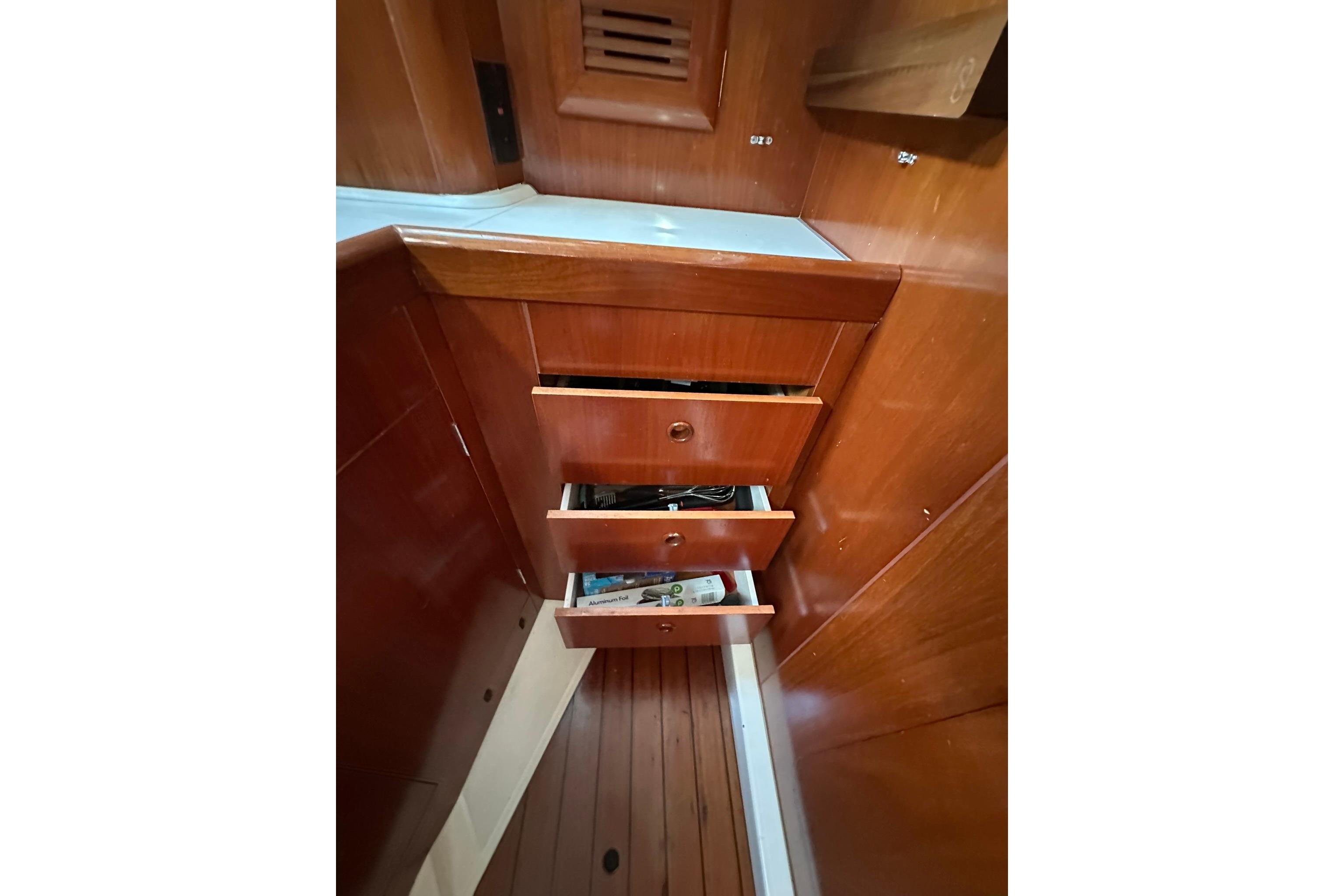 Wooden interior drawers on a 2000 Beneteau 50 yacht.