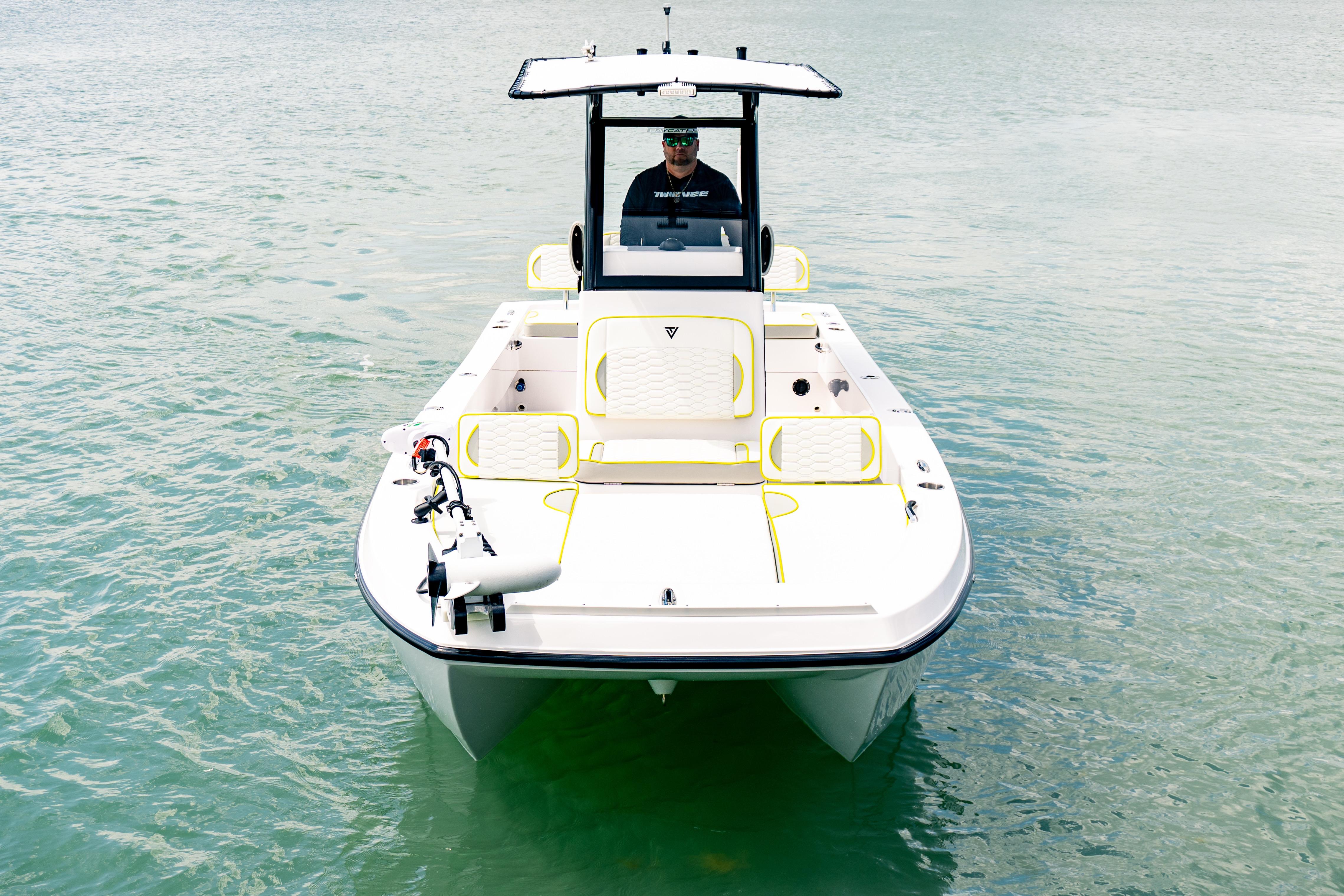 2026 Twin Vee 22 BayCat boat on calm water, front view.