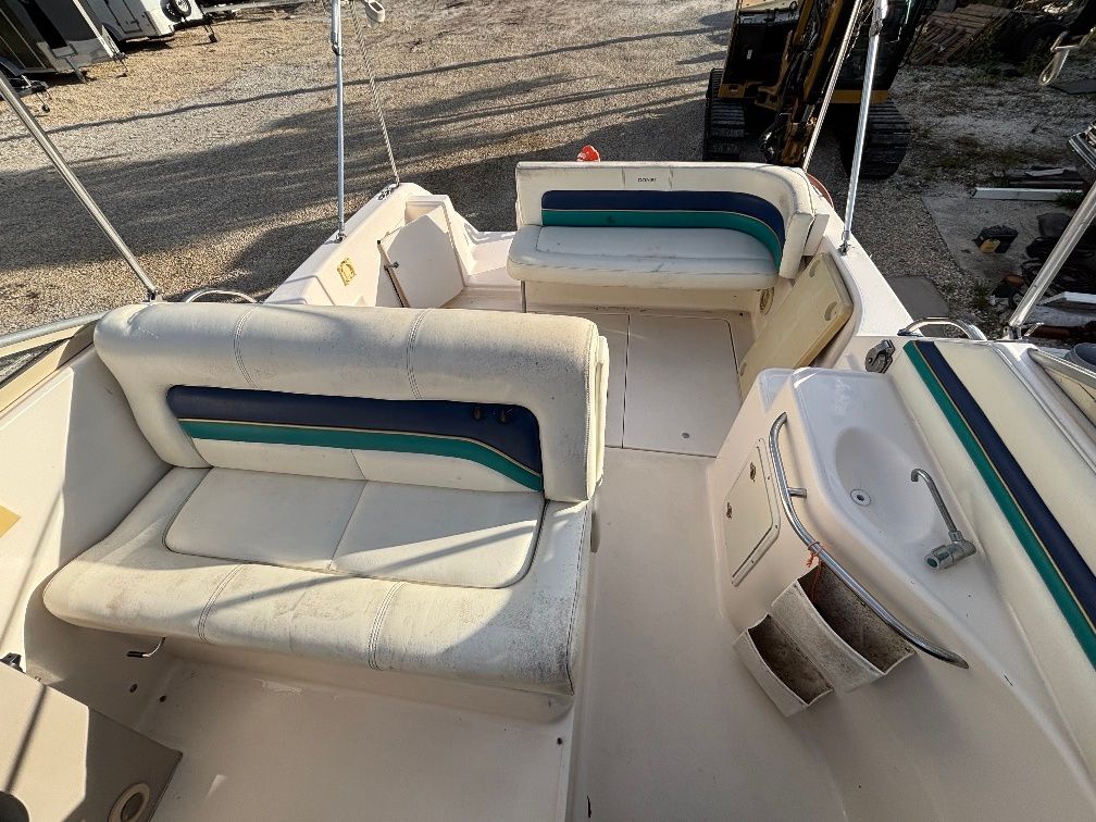 Interior of a 1997 Donzi 275LXC boat with seating area.