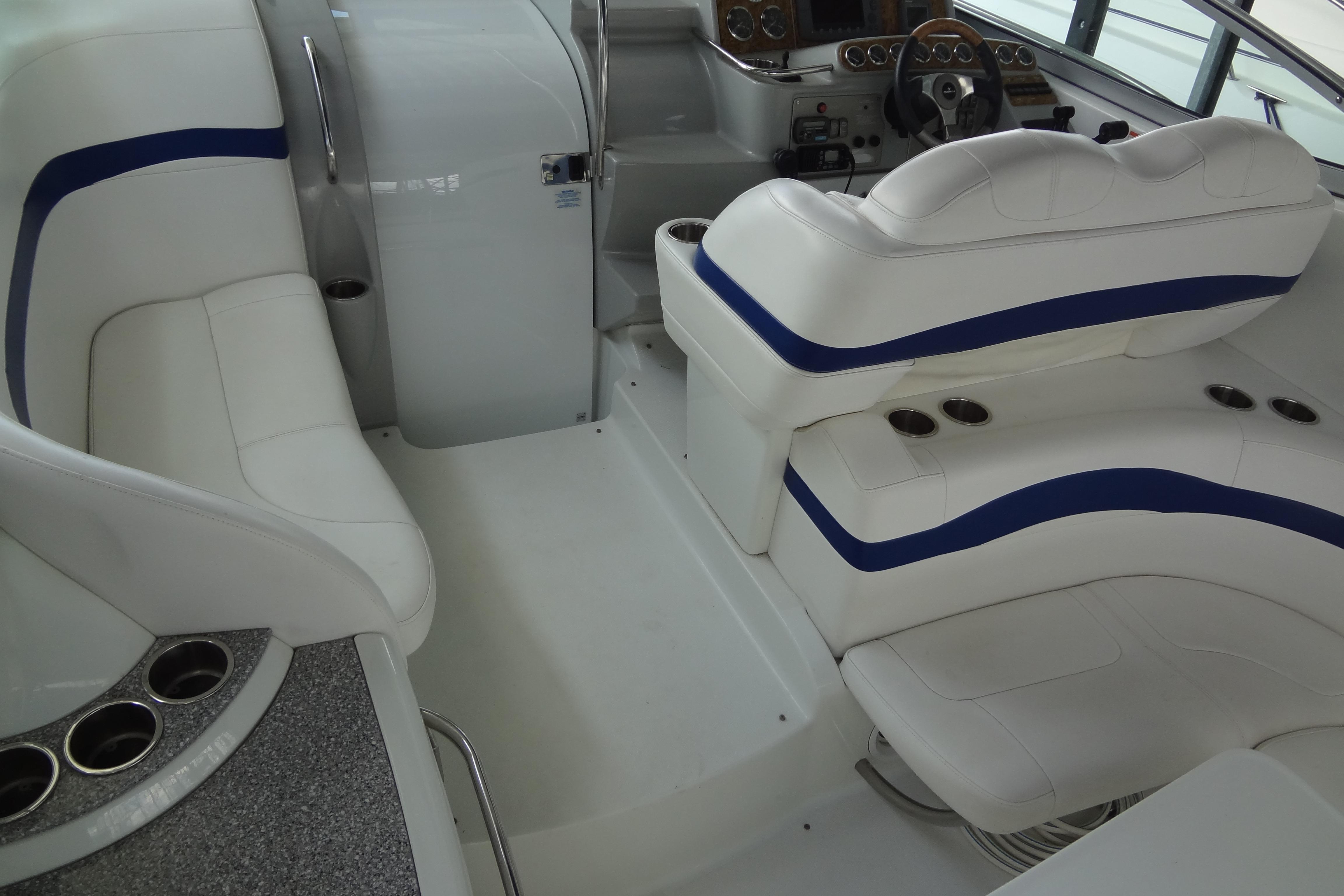 2007 Formula 34 Performance Cruiser interior with white seating and blue accents.