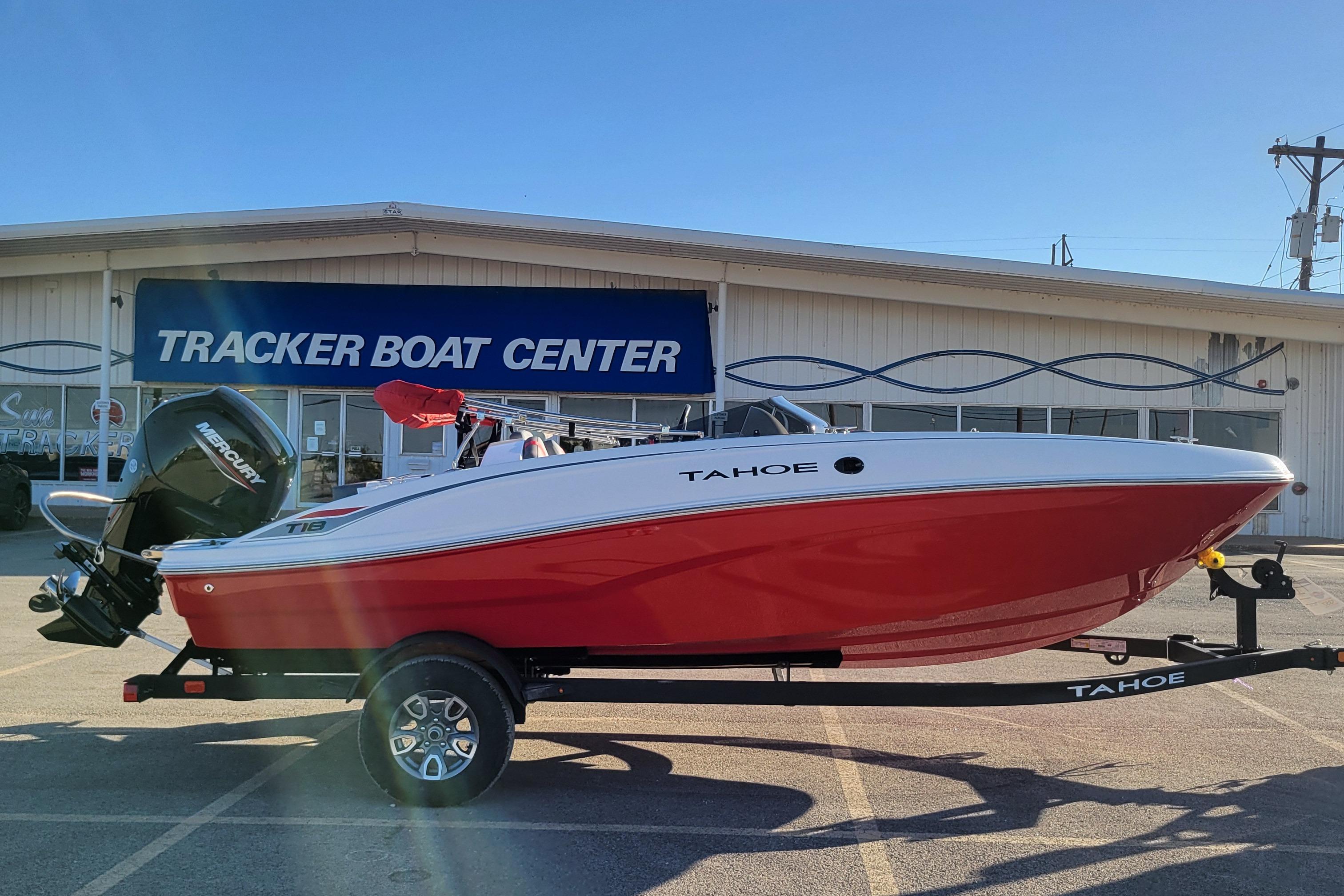 2026 Tahoe T18 boat in red and white at Tracker Boat Center.