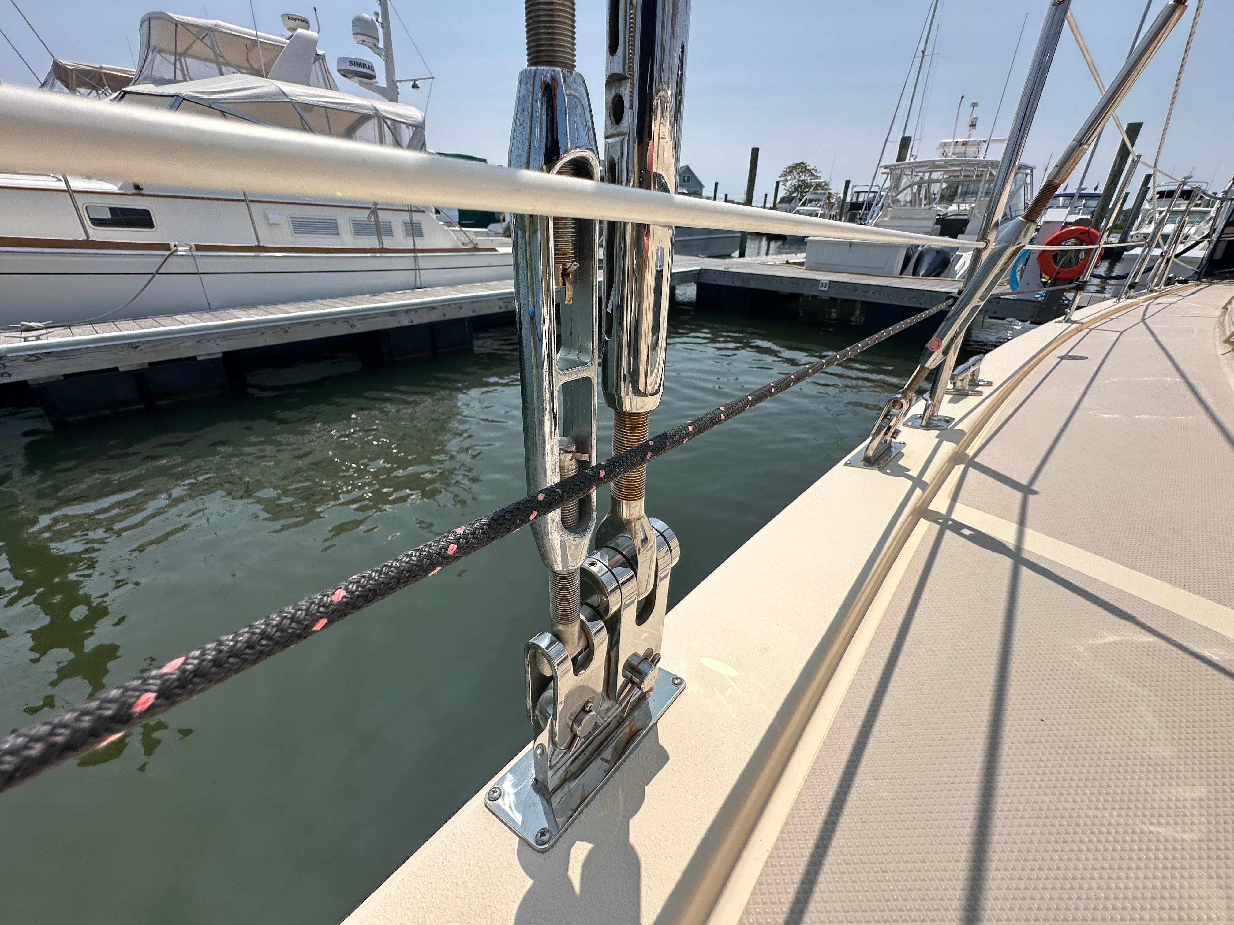 Close-up of Island Packet 439 sailboat rigging at a marina, 2021 model.