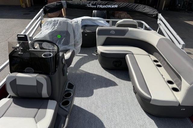 2026 Sun Tracker Bass Buggy 18 DLX pontoon boat with spacious seating and modern design.