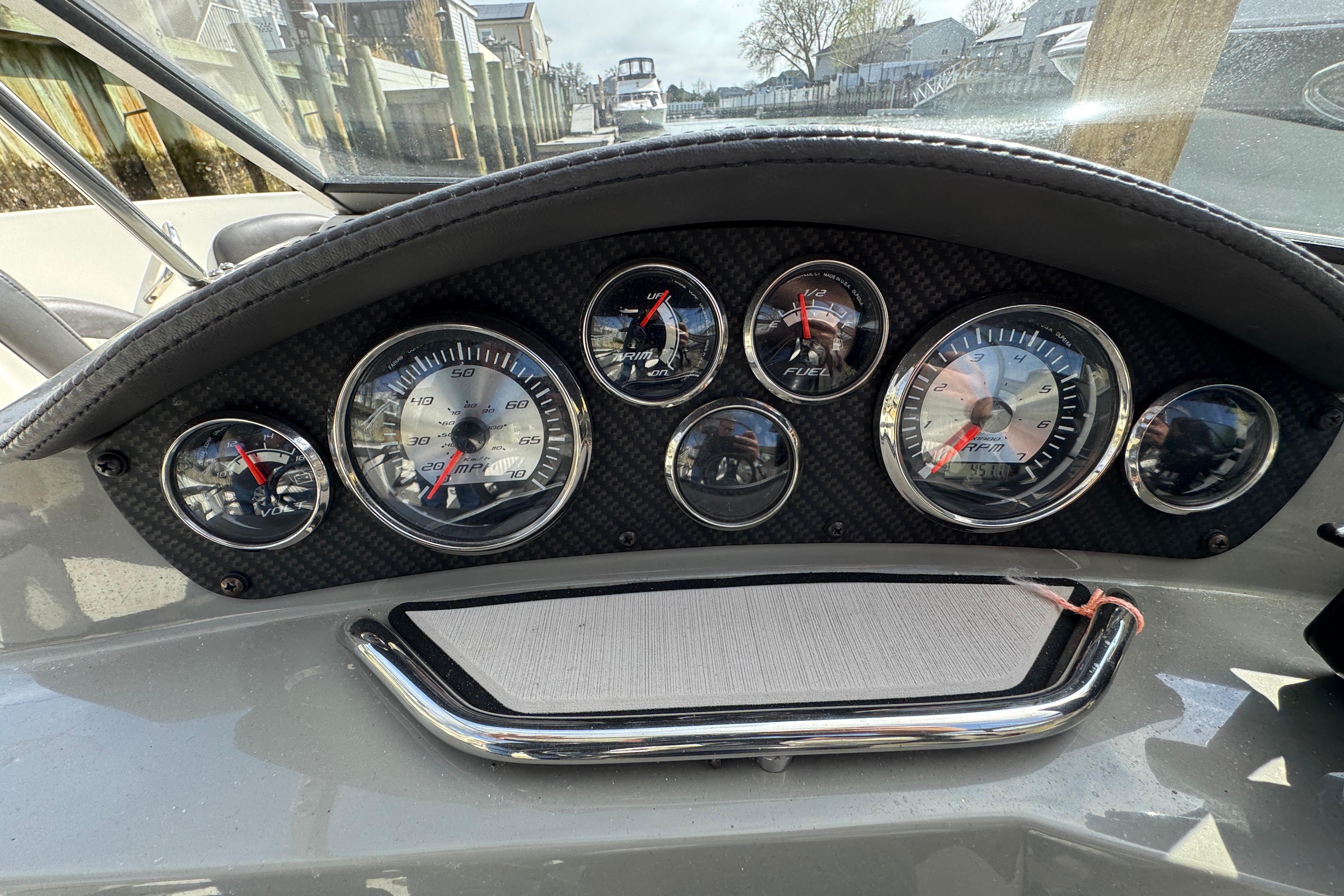 Dashboard of a 2019 Stingray 204 LR boat with gauges and controls.