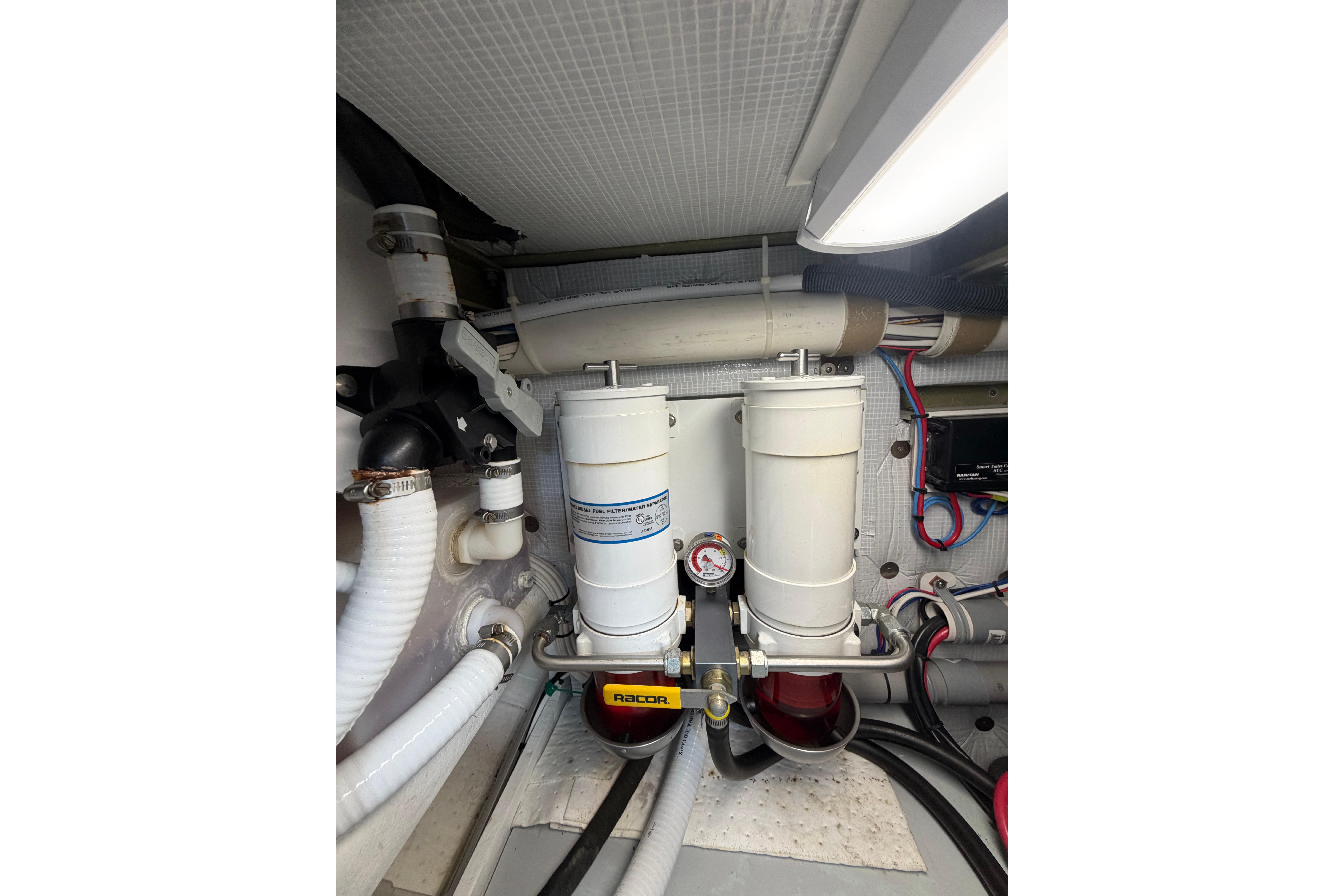 Engine room of 2018 H&H Marine Osmond Beal with fuel filtration system.