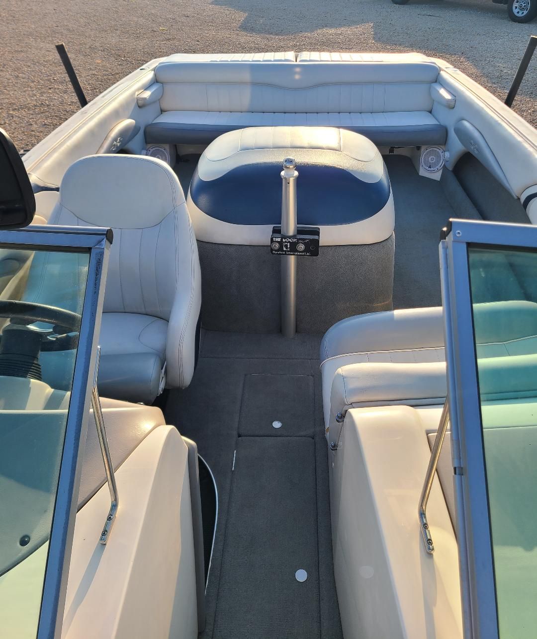 2003 MasterCraft X-9 boat interior with white seating and open cockpit view.
