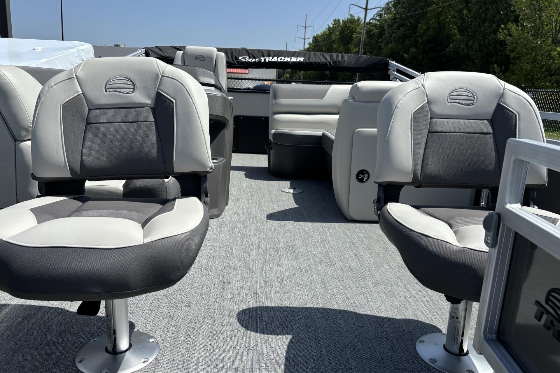 2026 Sun Tracker Fishin' Barge 20 DLX interior with comfortable seating and modern design.