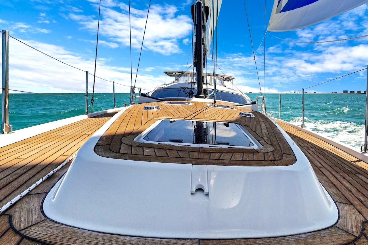 Sailing yacht Southerly 57 RS 2011 on open sea with clear skies.