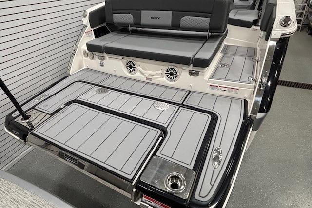 2026 Chaparral SSX 8 boat with sleek gray deck and seating area.
