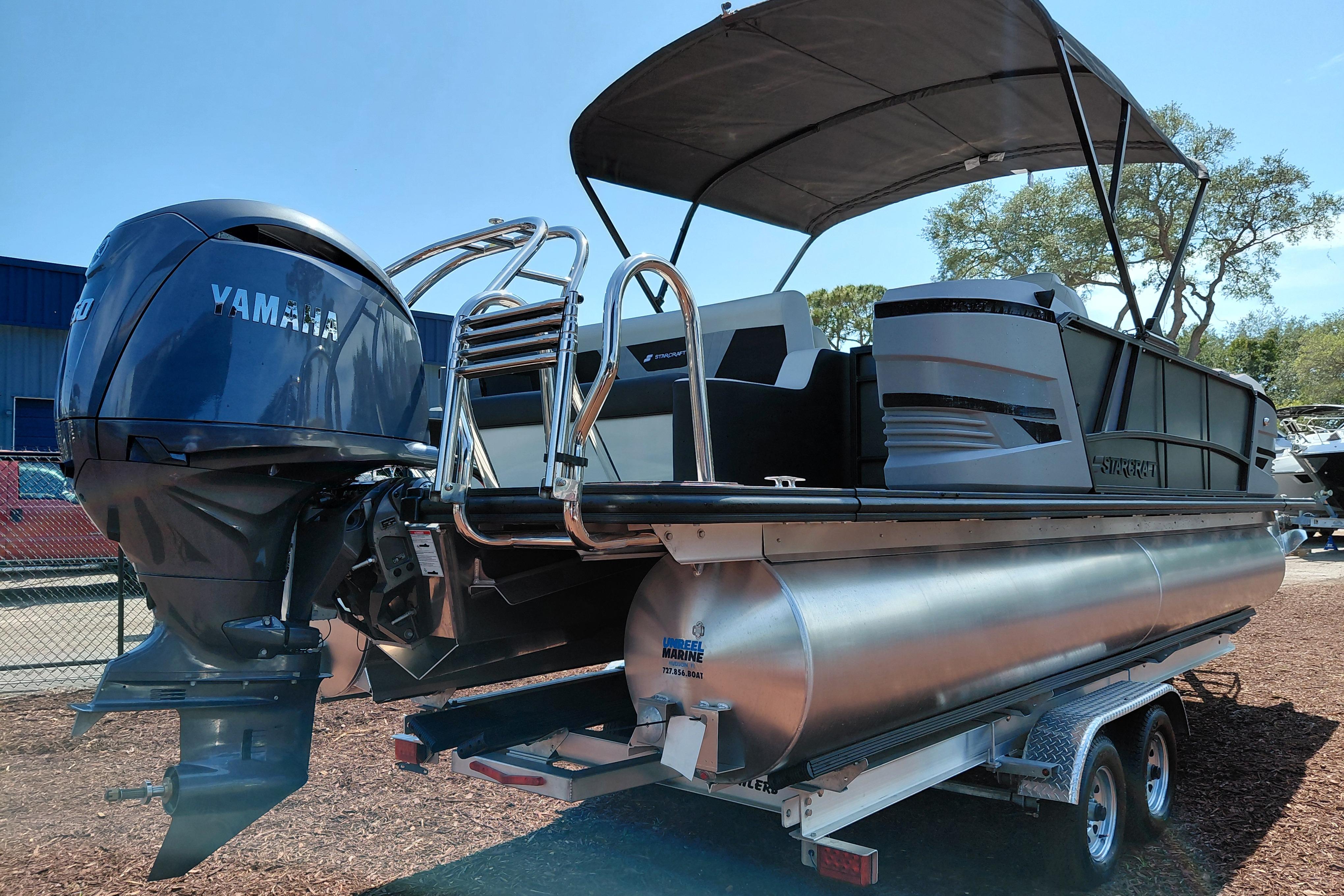 2026 Starcraft VX 24 Q DH pontoon boat with Yamaha engine on trailer.