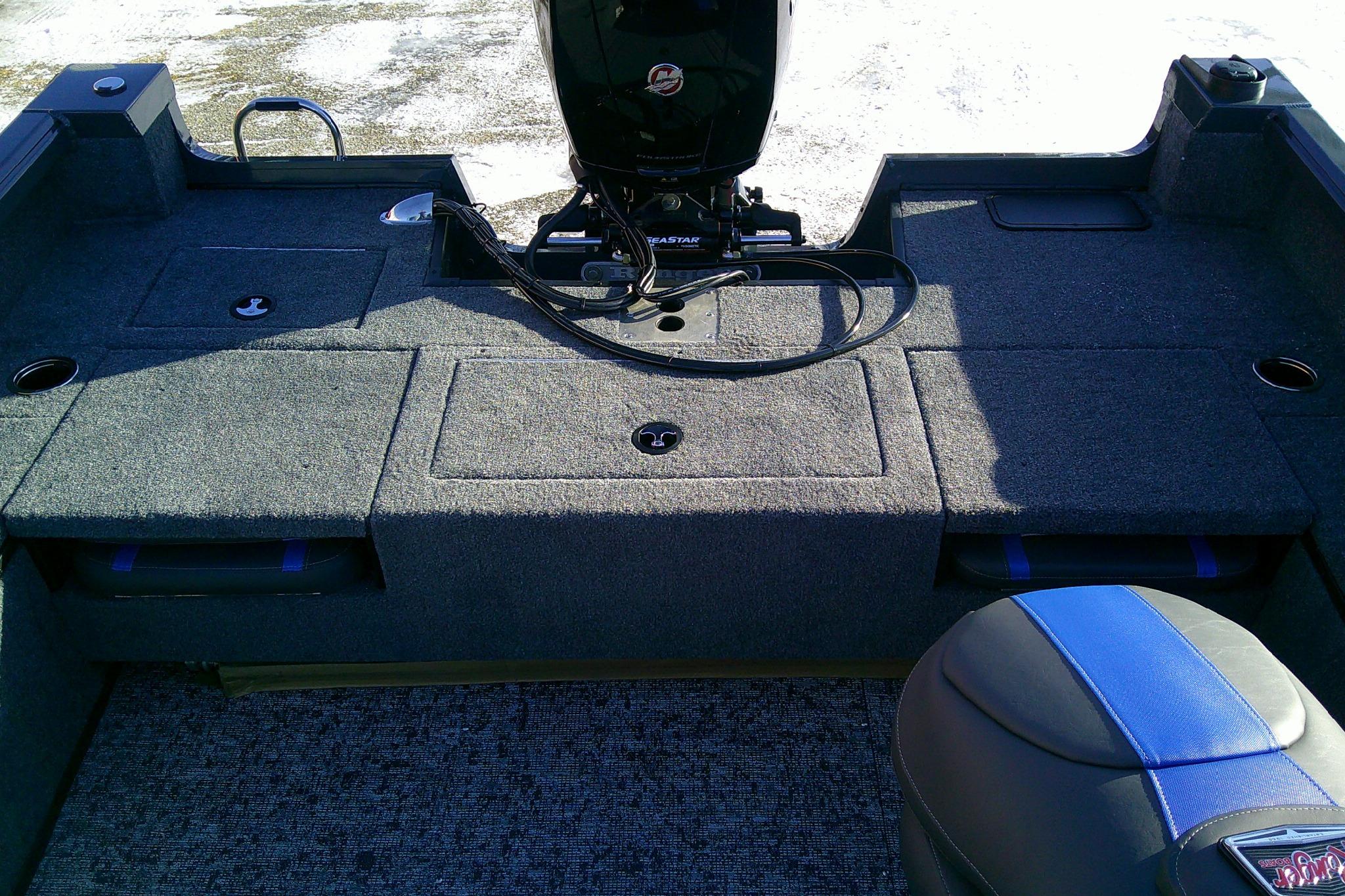 2026 Ranger VS1882SC Reata boat interior with motor and seating area.