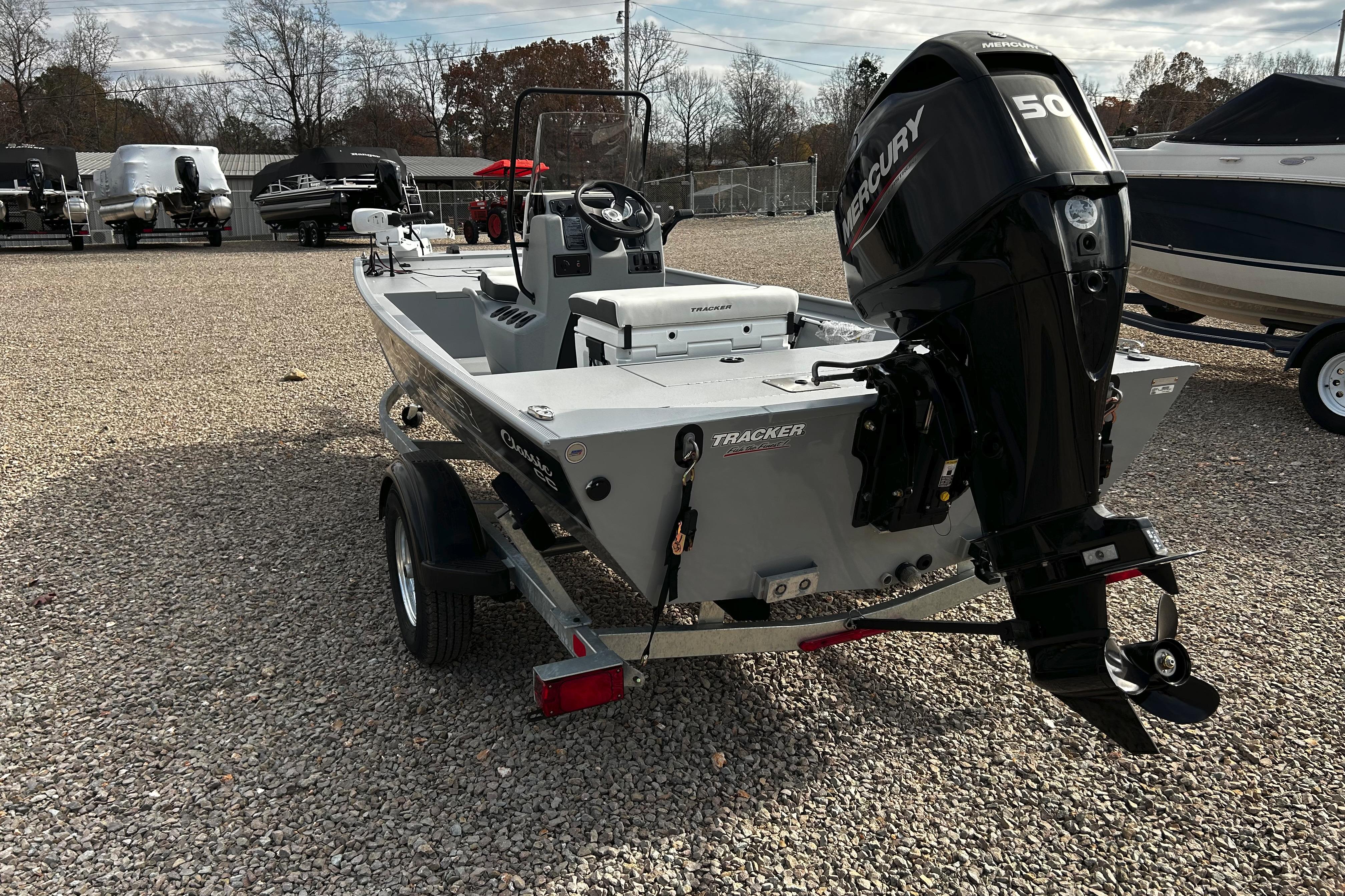2026 Tracker Bass Tracker Classic CC boat with Mercury engine on trailer.