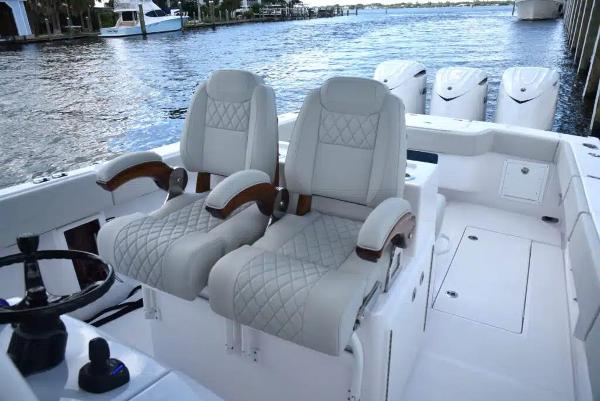 Manufacturer Provided Image: Luxury seating on 2026 Jupiter 380LS boat, featuring elegant design and waterfront view.
