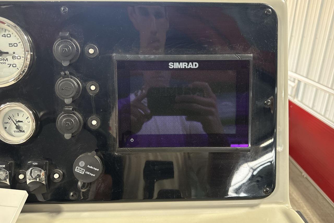 Dashboard of 2022 Landau ALURE 232 with Simrad display and gauges.