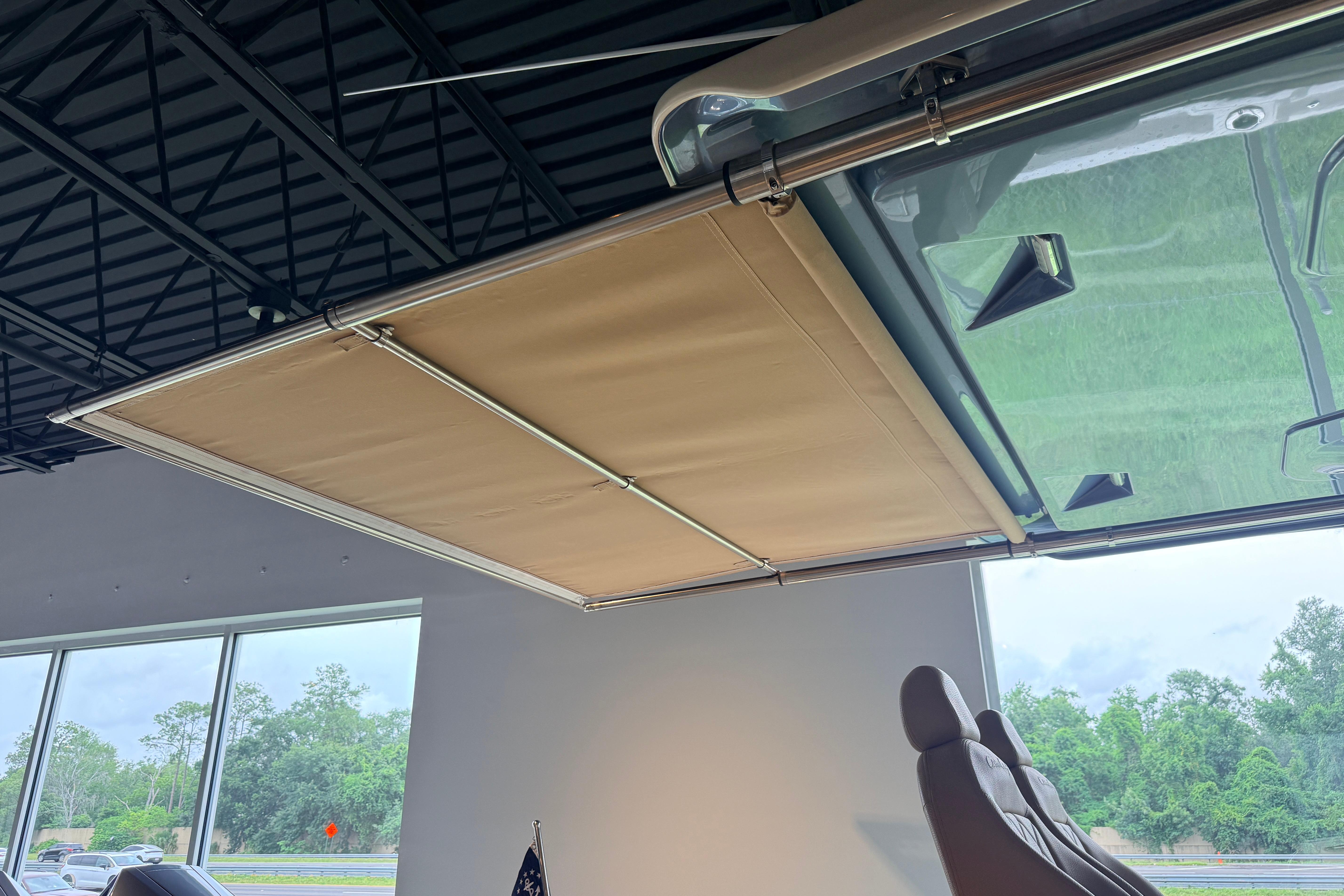 2024 Chris-Craft Catalina 30 boat canopy and seating, showroom view.