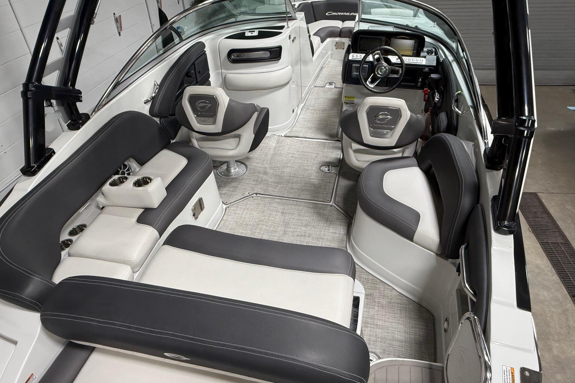 2023 Crownline 260 SS boat interior with luxurious seating and modern dashboard.