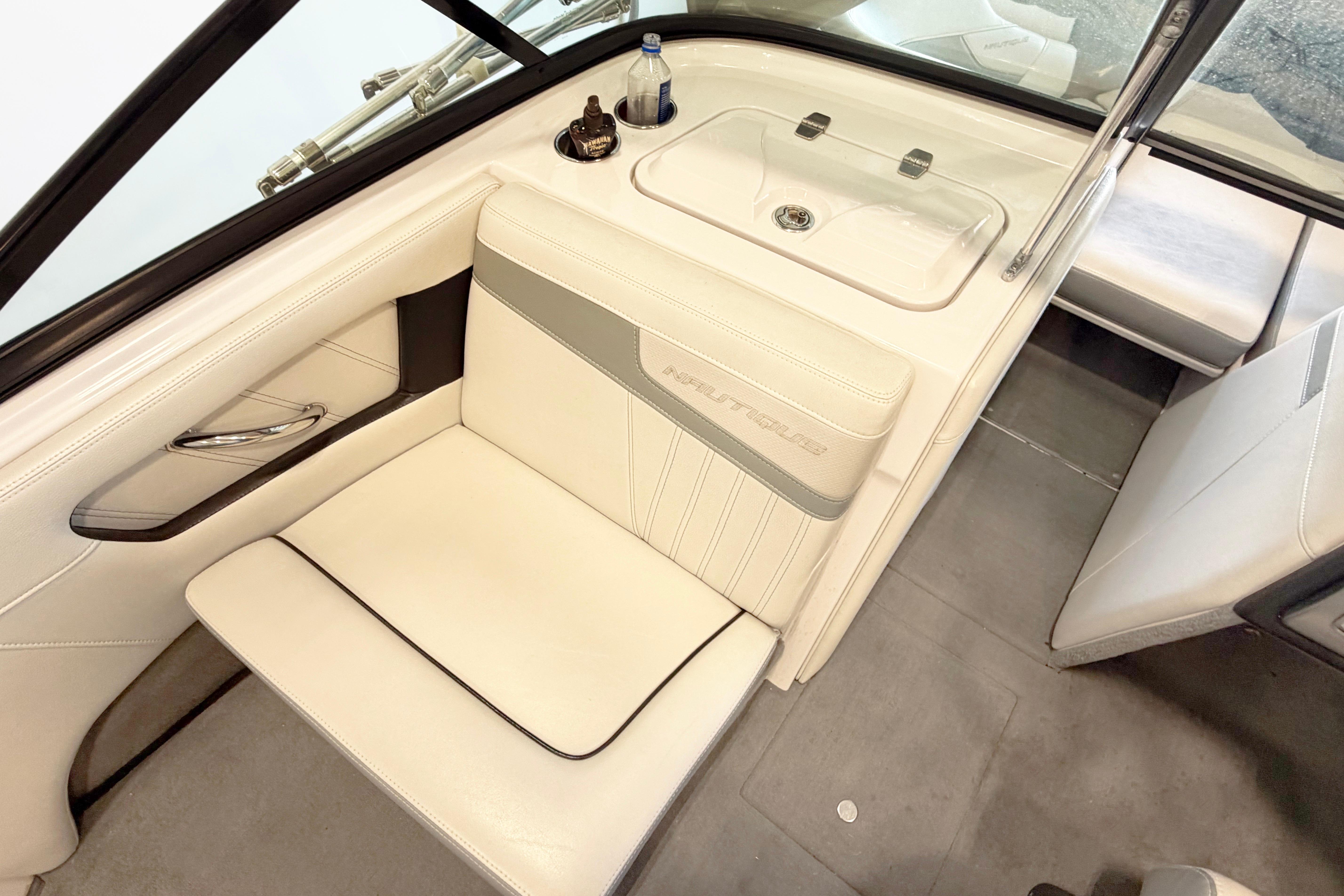 2014 Nautique Ski Nautique 200 Open Bow interior with white seating and sleek design.