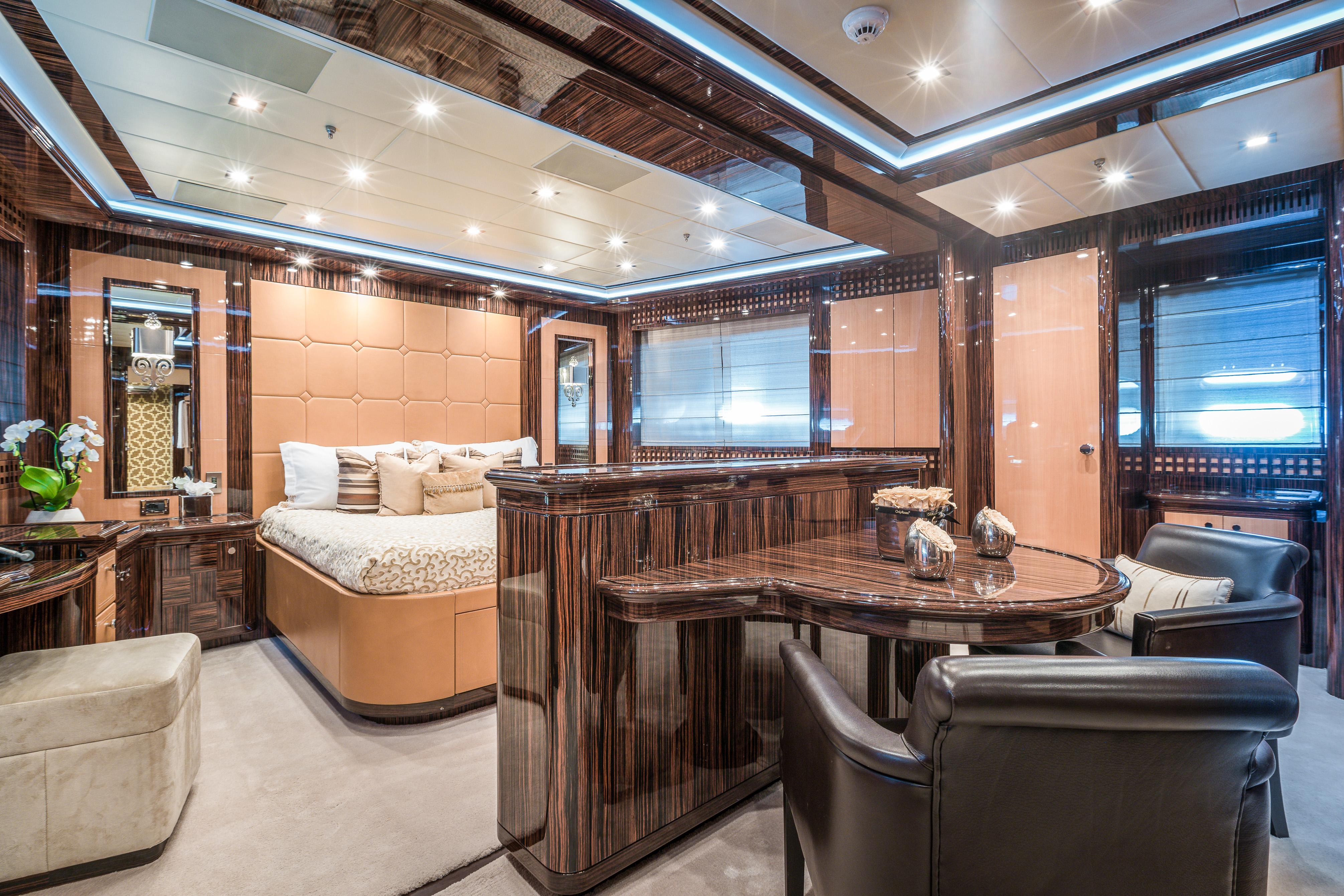 Luxurious interior of 2011 Mangusta 165 yacht with elegant furnishings and modern design.