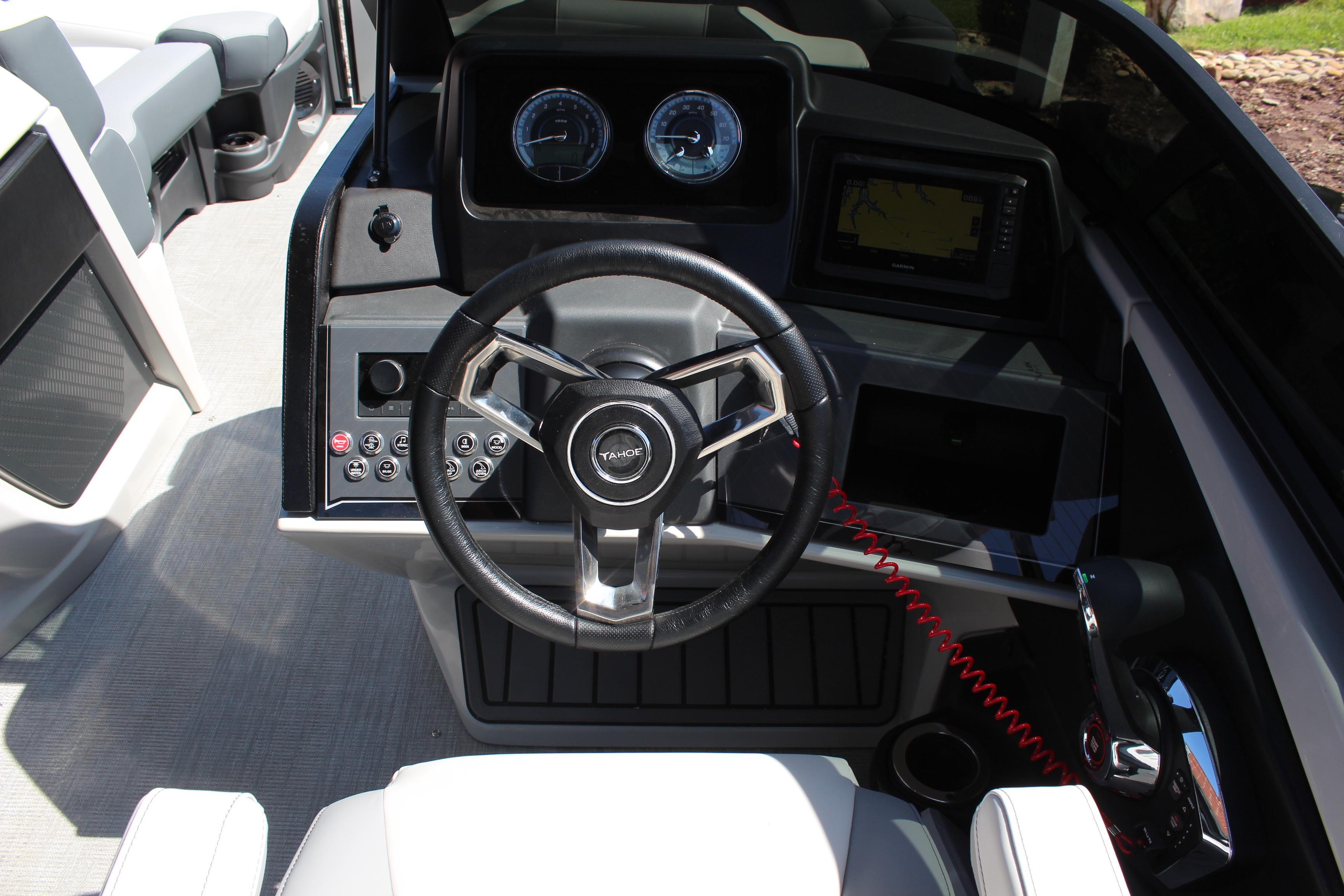 2025 Tahoe Pontoon Cascade Quad Lounge Windshield dashboard with steering wheel and controls.