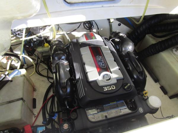 Engine compartment of a 2017 Larson 292 LXI boat, featuring a 6.2L 350 horsepower engine.