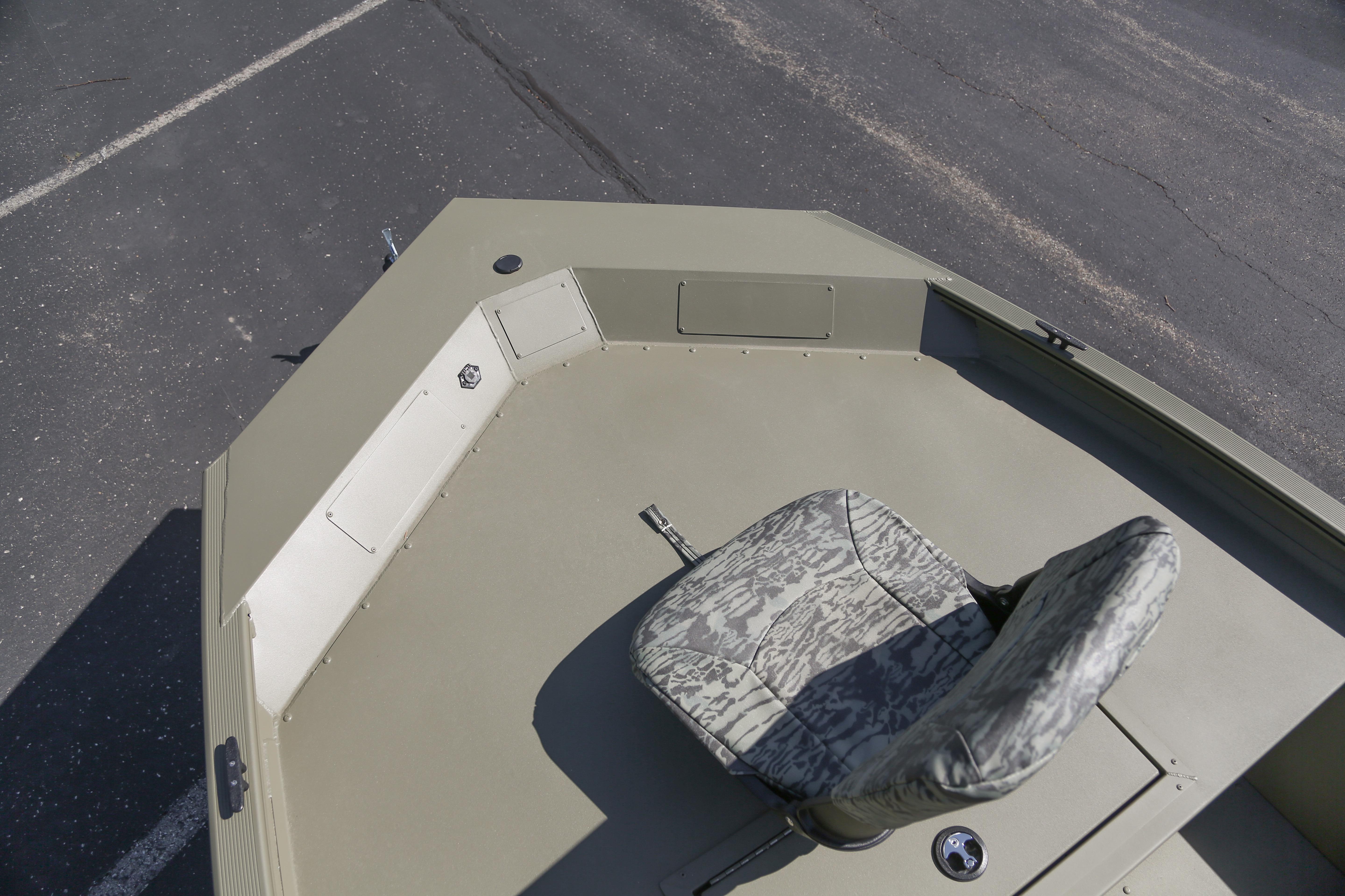 2026 Tracker Grizzly 1754 SC boat deck with camo seat, spacious layout.