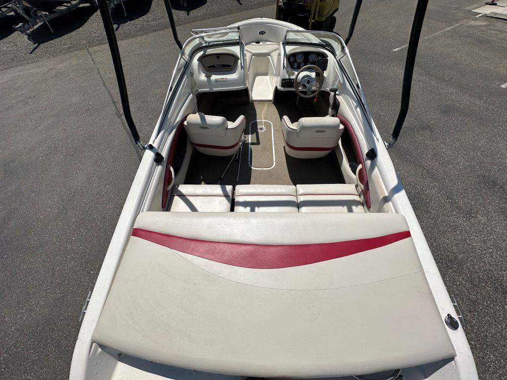 2003 Chaparral 180 SS boat interior with seating and steering wheel, viewed from above.