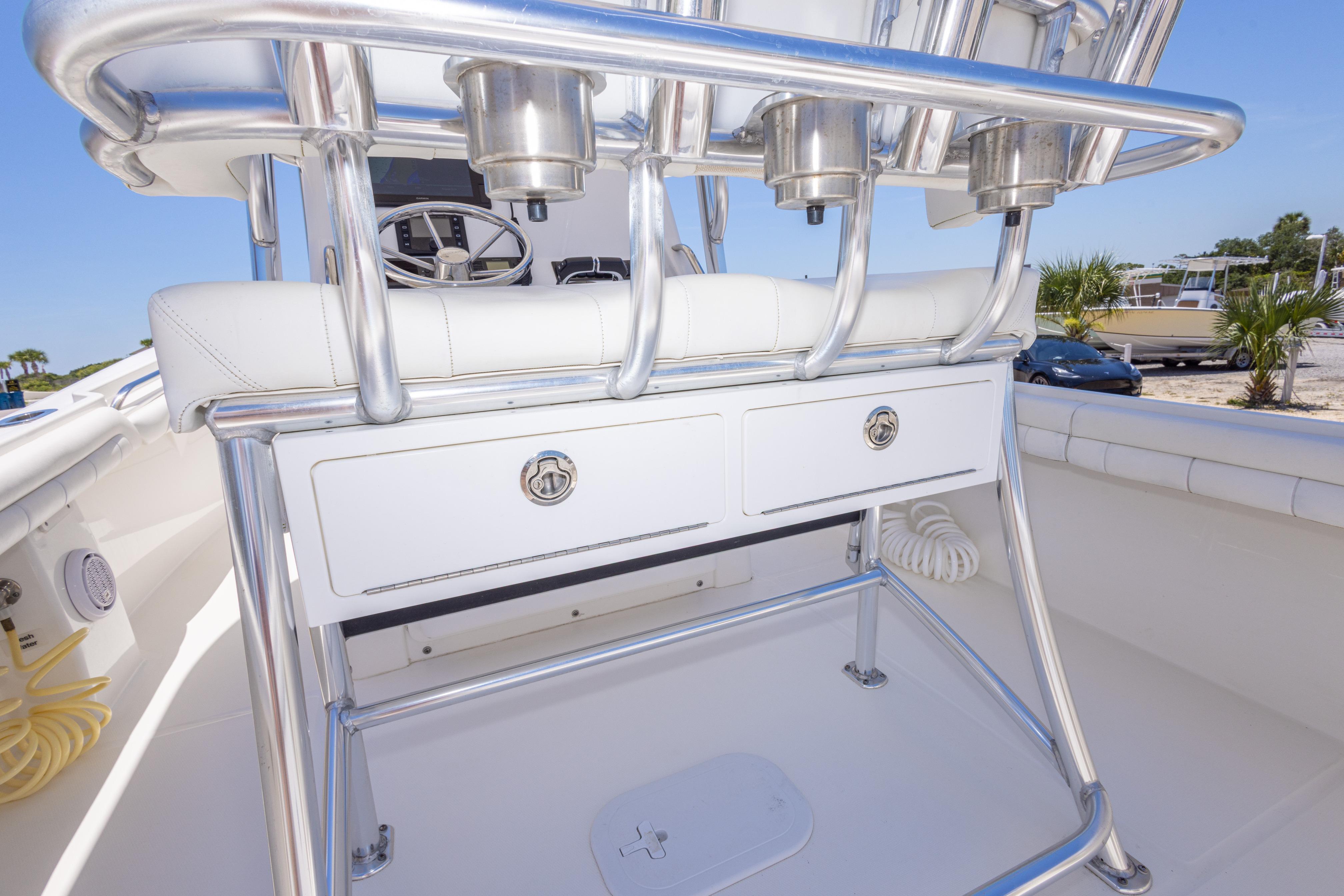 2019 Regulator 23 Center Console boat interior with storage drawers and seating.