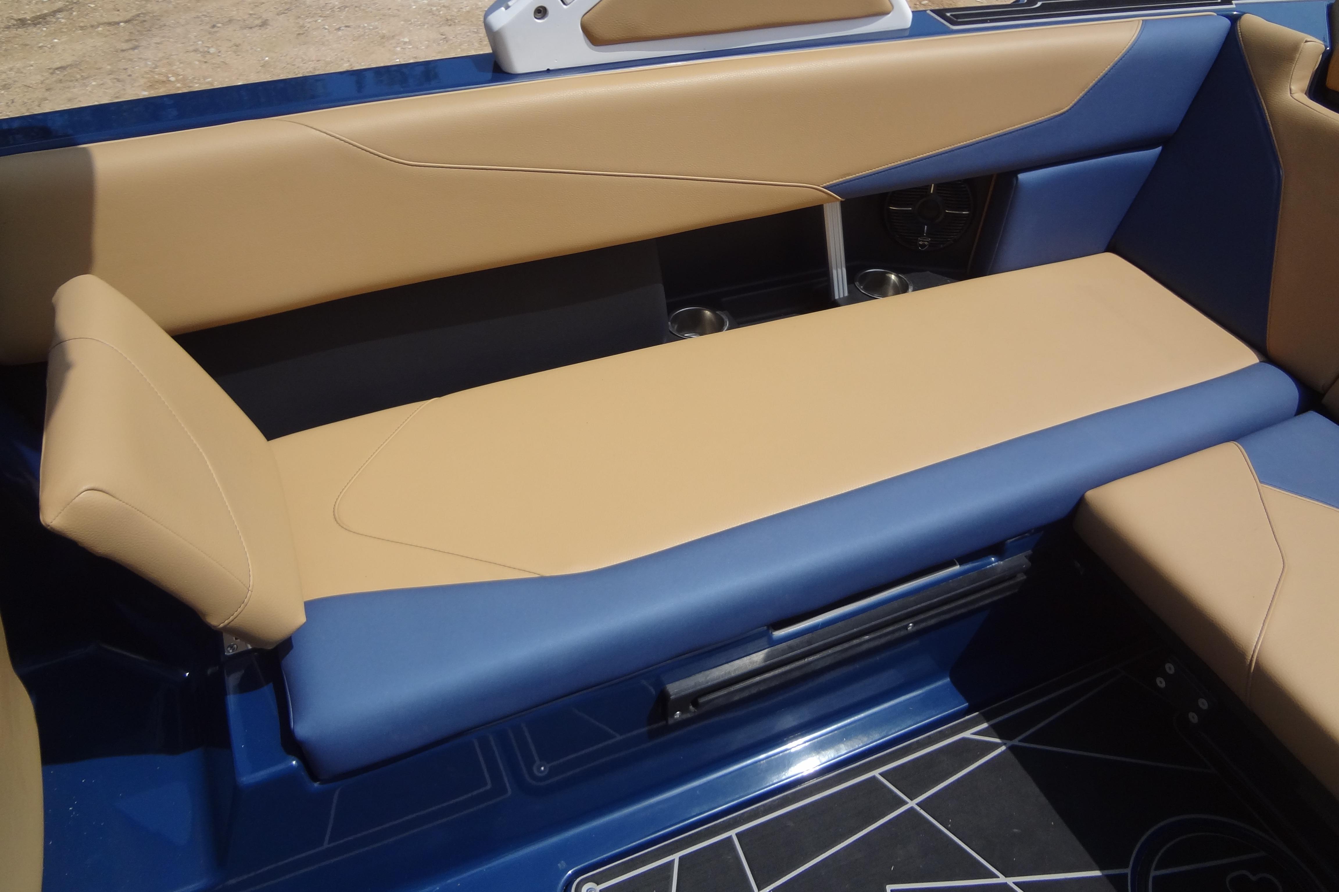 2022 ATX Surf Boats 24 Type-S interior with tan and blue seating.