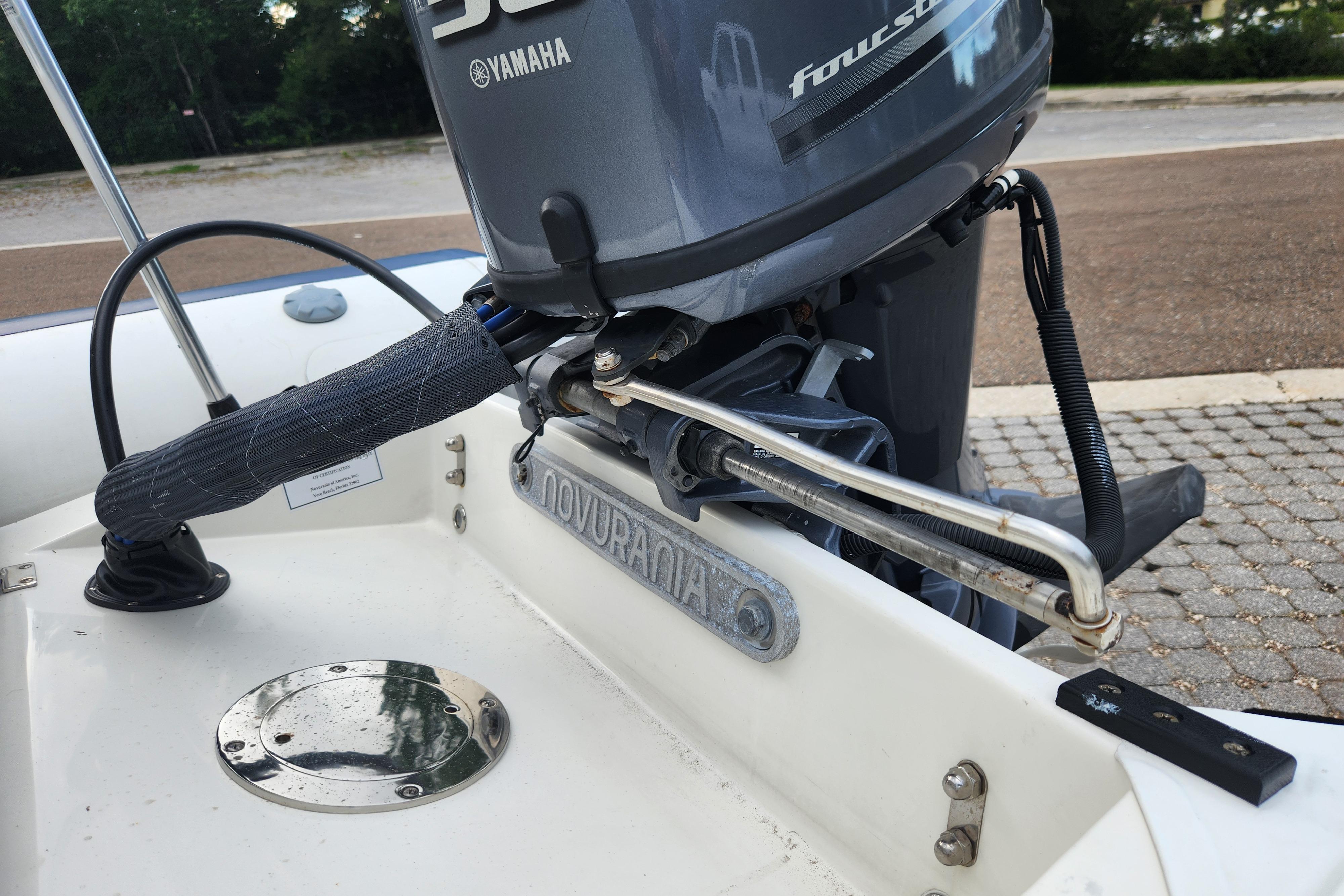 2019 Novurania DL 400 boat with Yamaha outboard motor, close-up view.