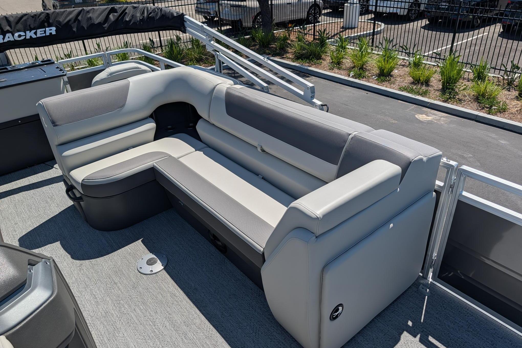 2026 Sun Tracker Fishin' Barge 22 DLX with comfortable seating and modern design.