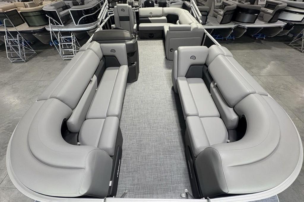 2026 Sun Tracker PARTY BARGE® 20 DLX pontoon boat with spacious seating and modern design.