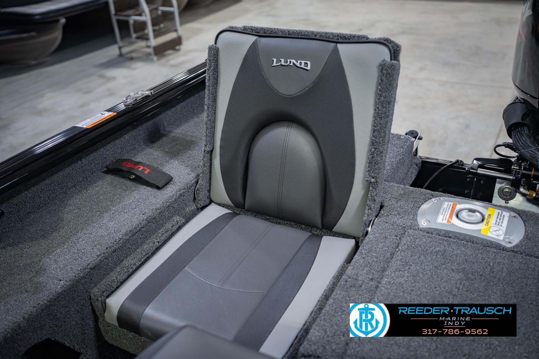 2026 Lund 1775 Impact XS boat seat, gray upholstery, Reeder-Trausch Marine logo visible.