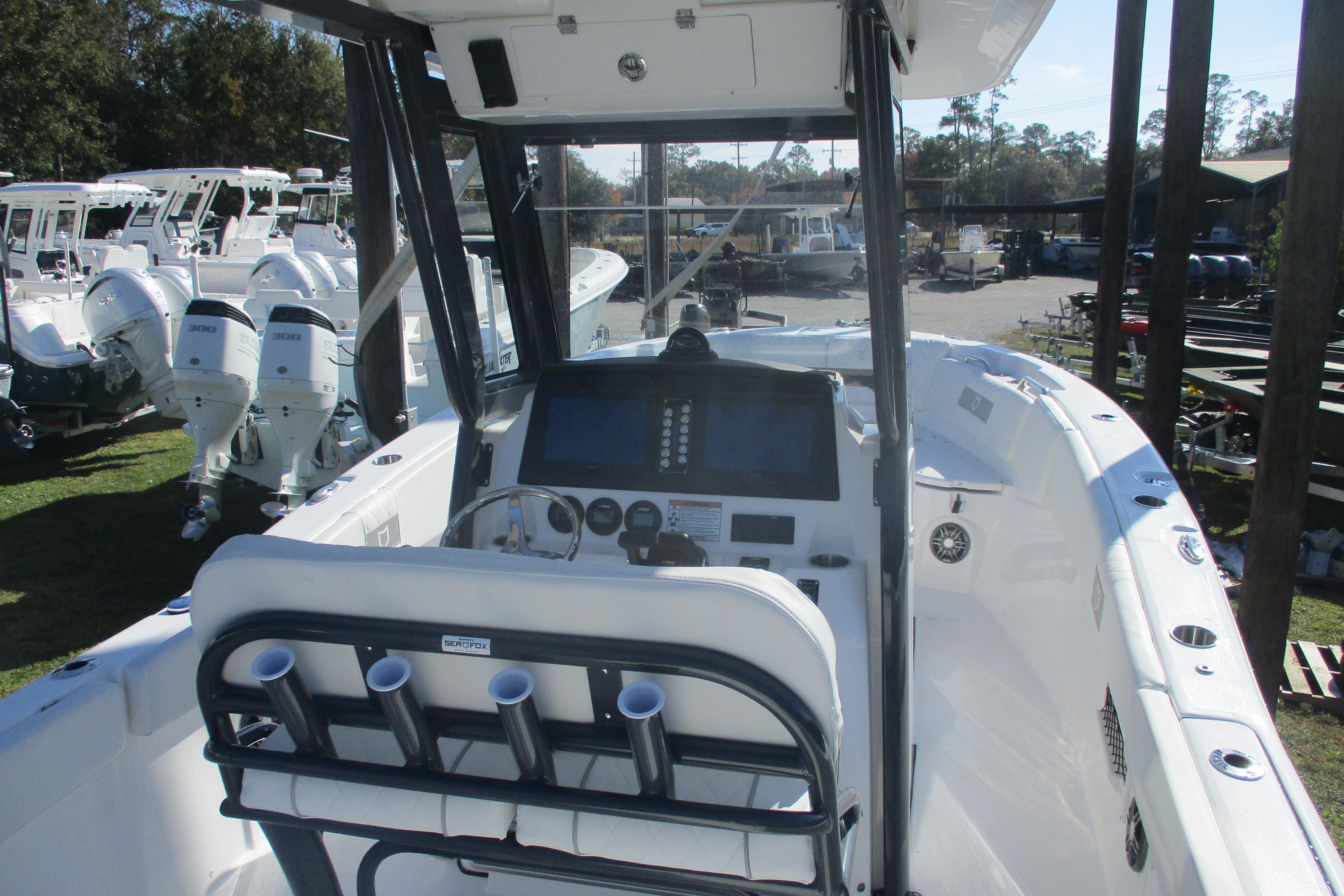 2026 Sea Fox 268 Commander boat interior with helm and seating area.