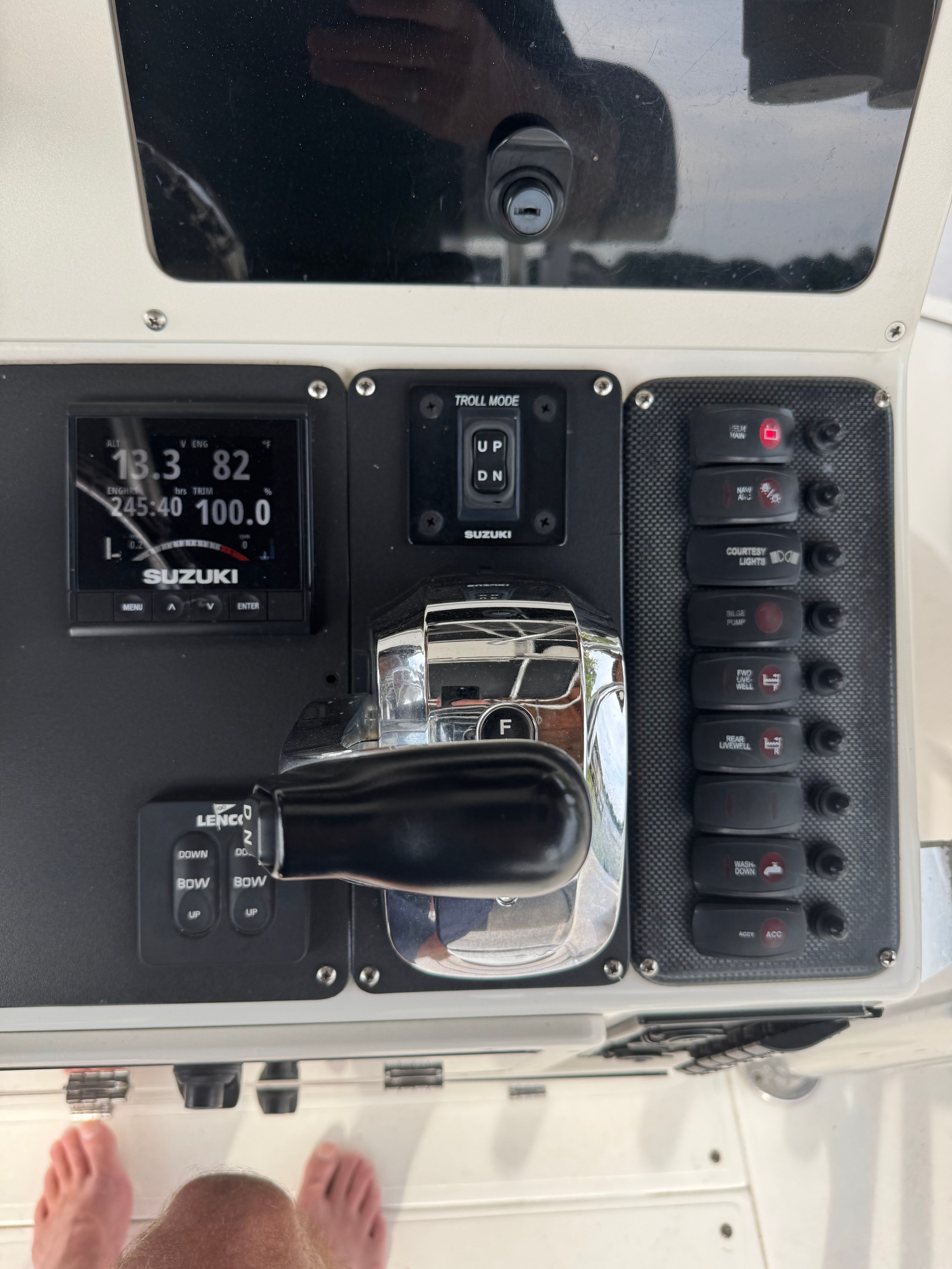Control panel of a 2004 ShearWater LTZ boat with Suzuki displays.