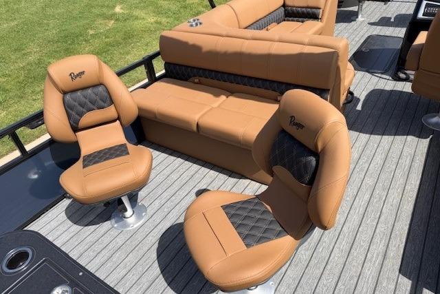 Luxurious seating on 2026 Ranger 223F boat with tan and black upholstery.
